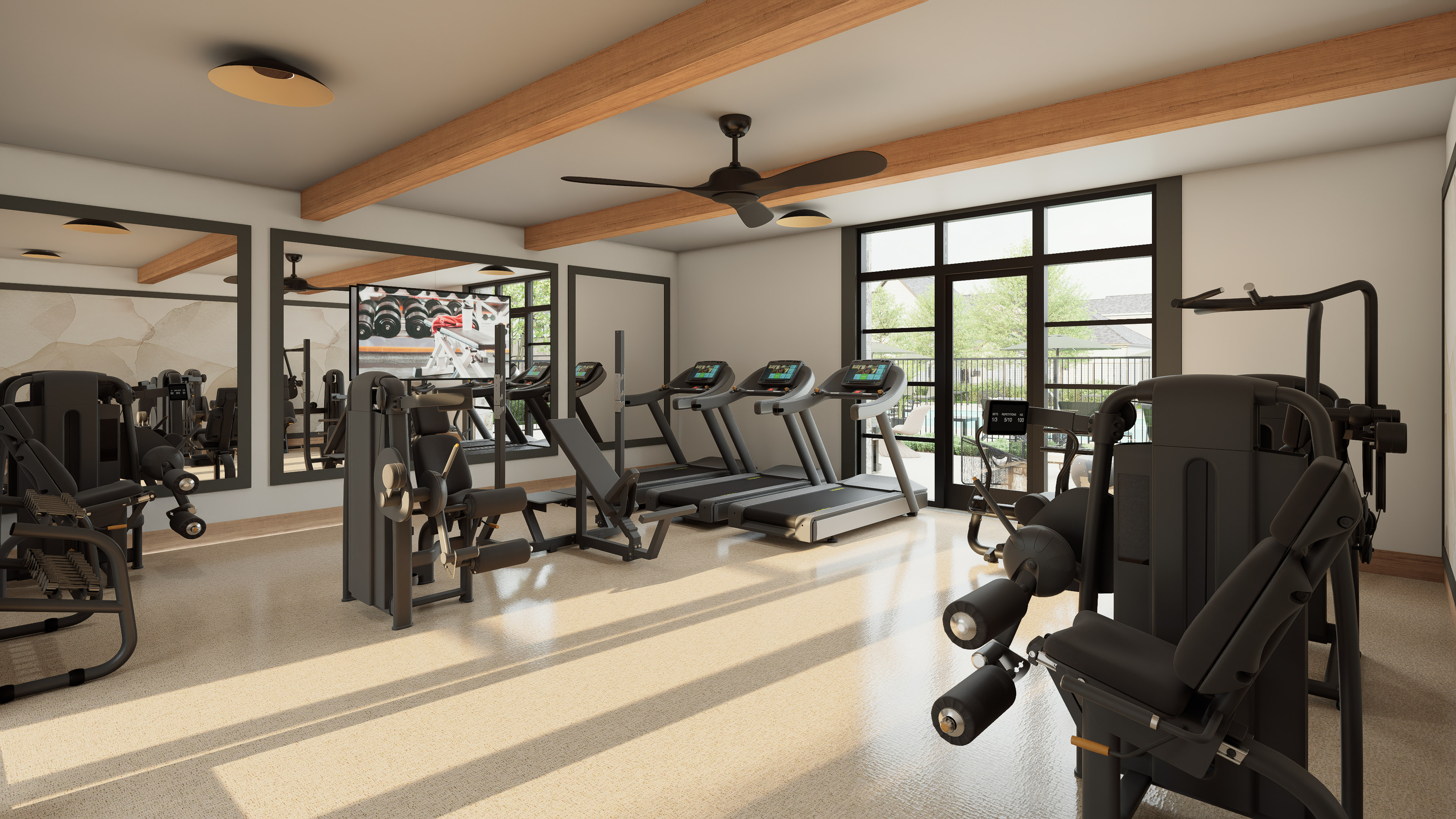 In the foreground, a weight machine stands prominently, while the background reveals treadmills, mirrors, and large windows overlooking an outdoor scene.
