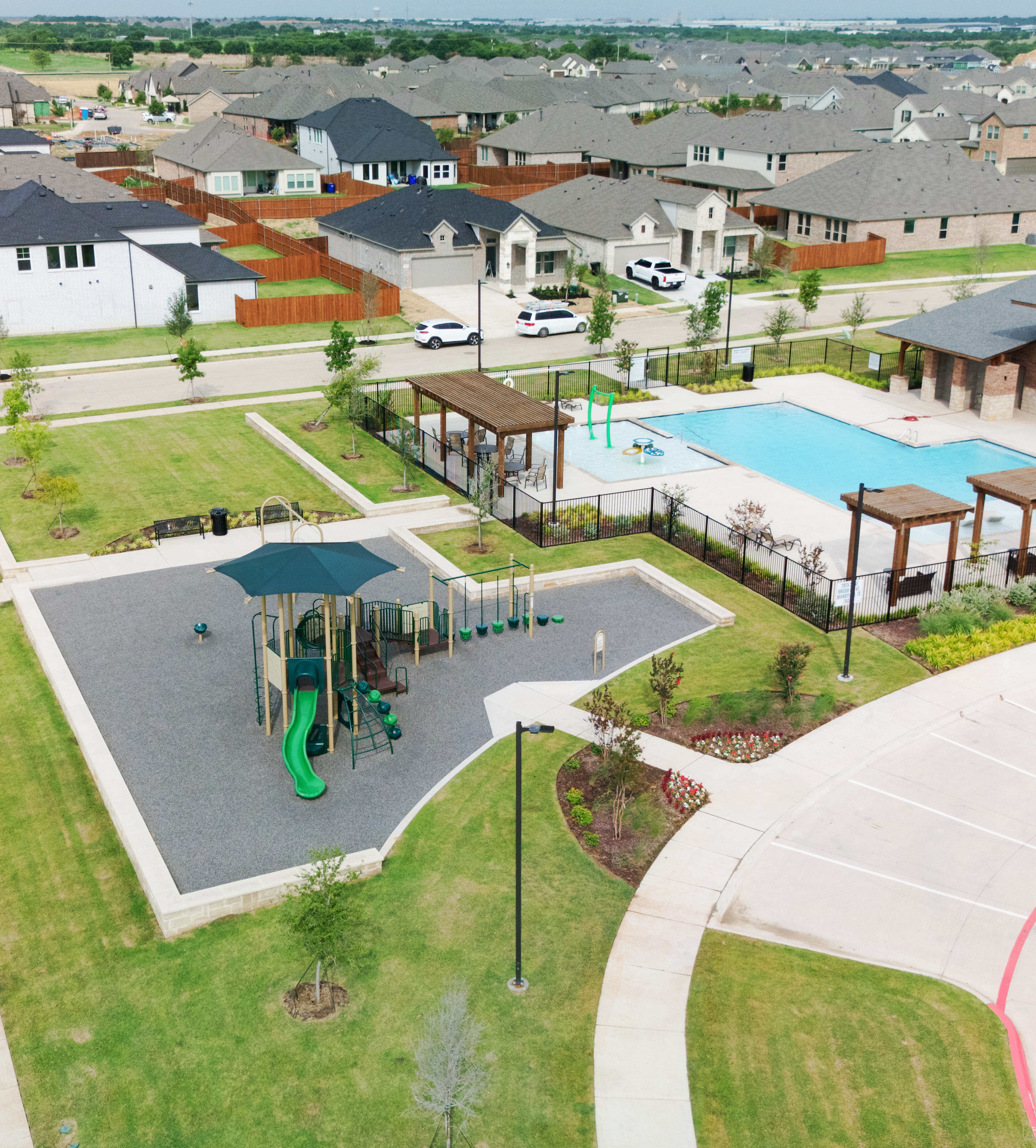 A resort style pool, modern playscapes, and scenic trails create a vibrant retreat for relaxation and connection.