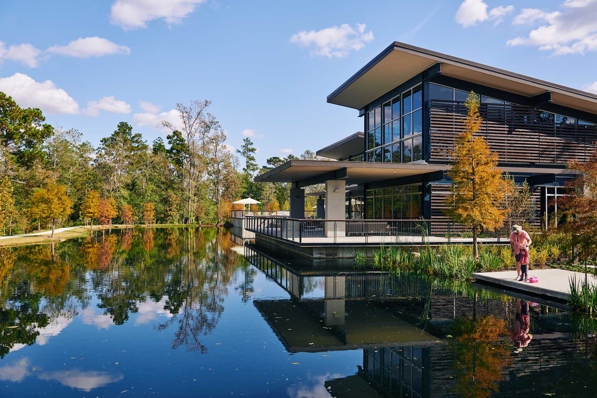 Where lake views and laughter meet—Woodson’s Club invites connection with fitness, gatherings, and relaxation at the heart of the community.