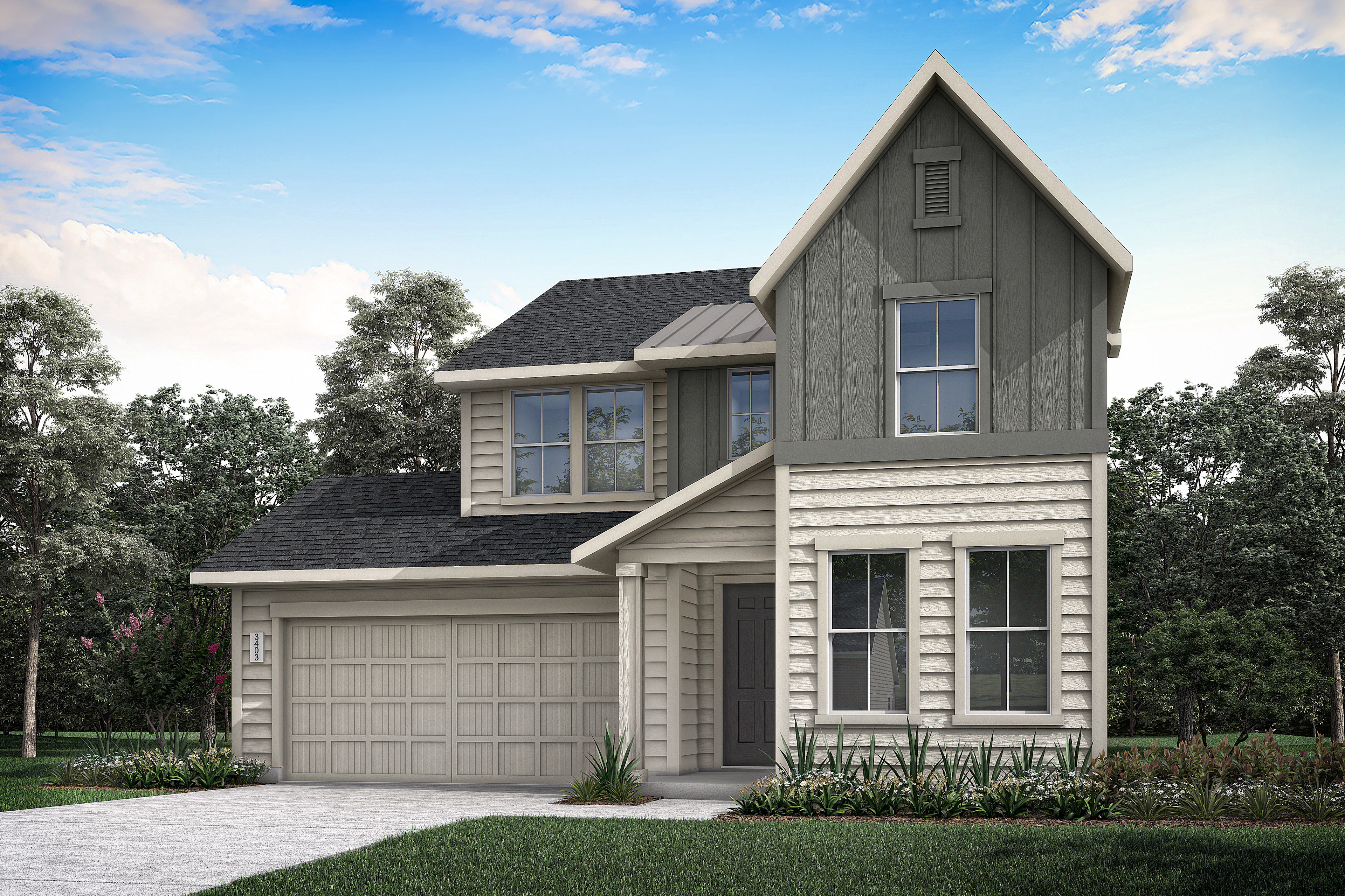 A two-story house with a gabled roof, gray siding, and a garage door stands in a landscaped yard surrounded by trees against a blue sky with scattered clouds.