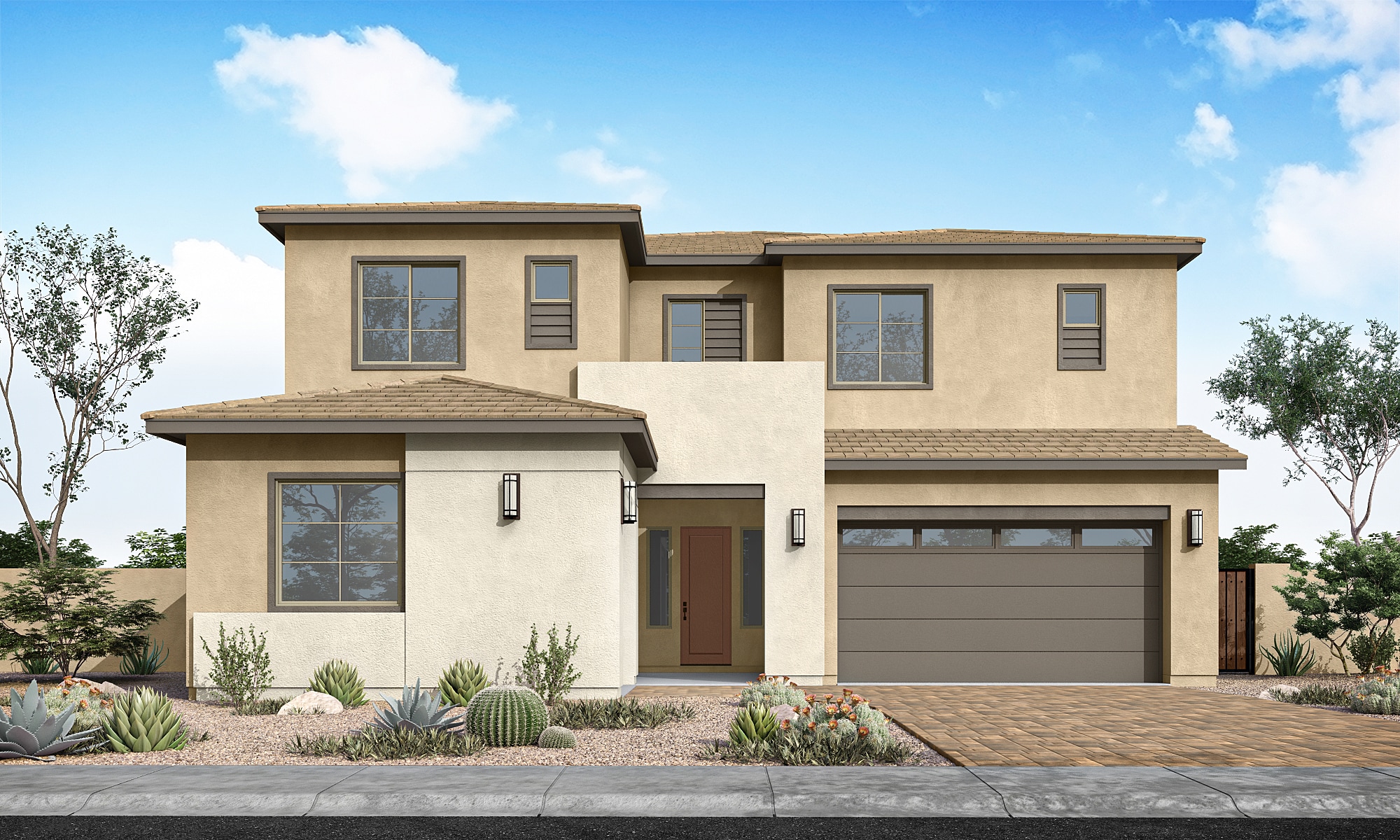 A modern tan and cream stucco house with a two-car garage sits in the foreground, surrounded by desert landscaping, under a bright blue sky with scattered clouds.