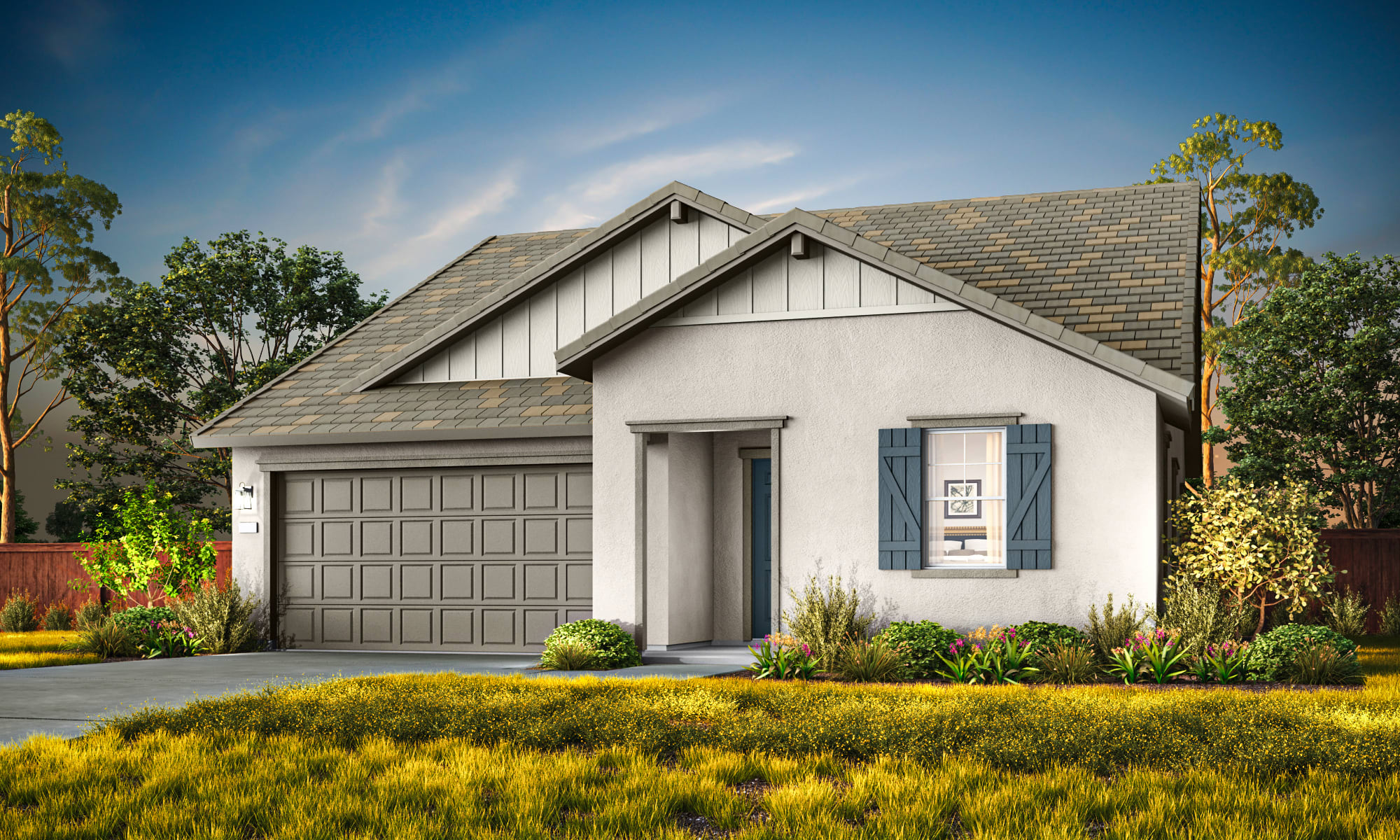 A quaint, single-story house with a gray exterior and a gabled roof sits amidst a lush, colorful garden, surrounded by trees and a clear blue sky.