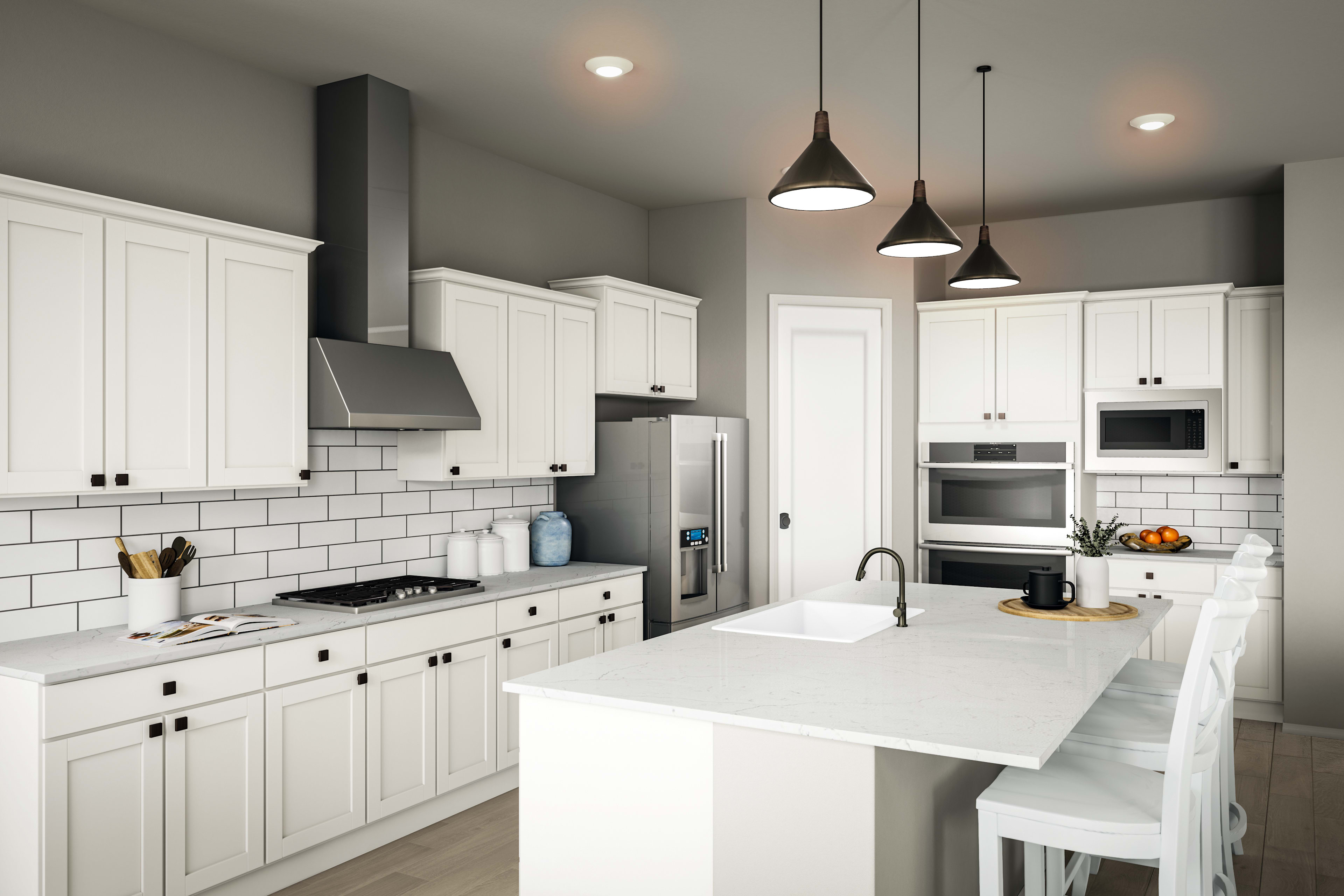 A modern, well-lit kitchen with white cabinets, a central island, and pendant lighting fixtures, creating a clean and inviting atmosphere.