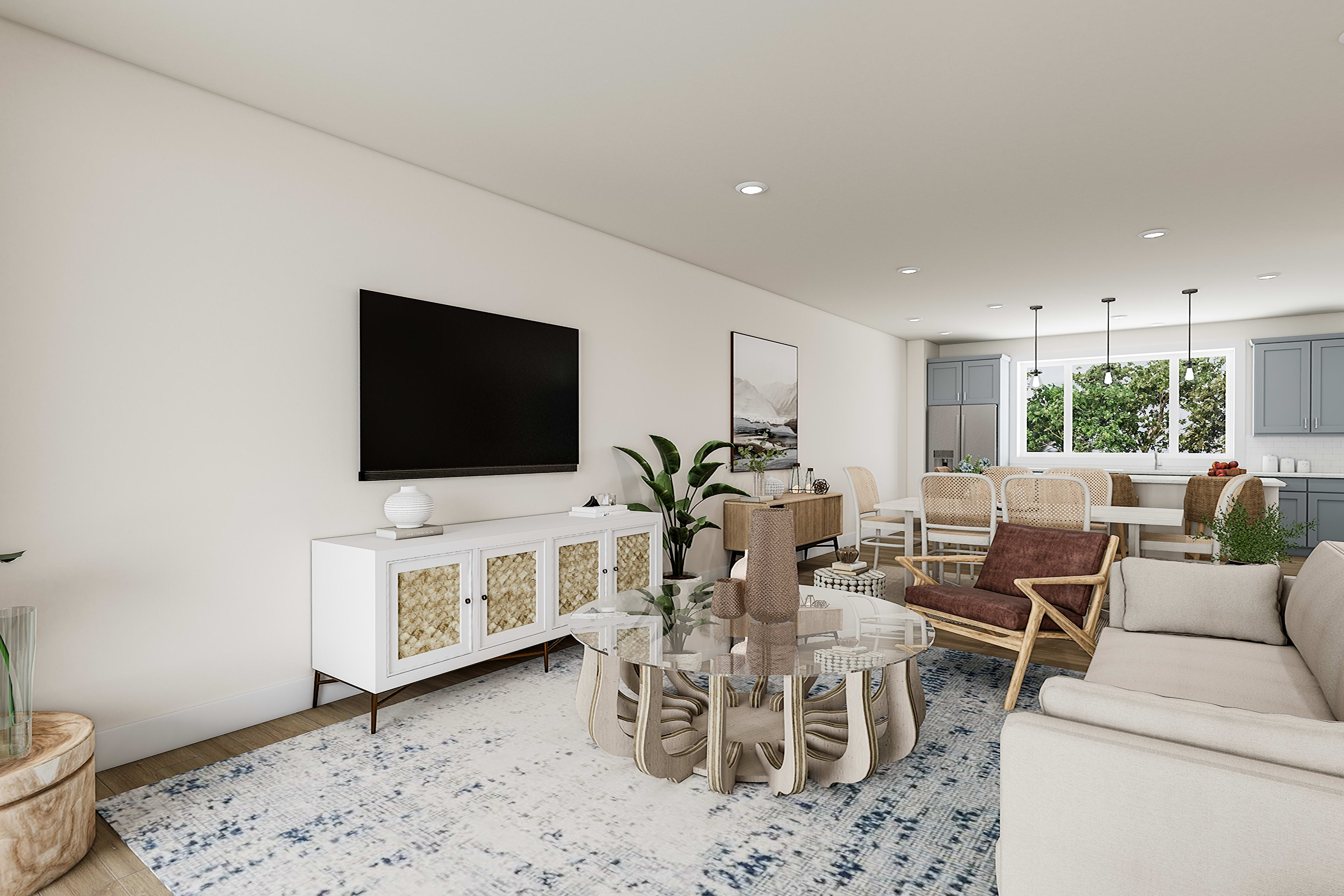 A cozy and well-furnished living room with a large TV, a wooden dining table, and a comfortable sofa set against a backdrop of large windows overlooking greenery.