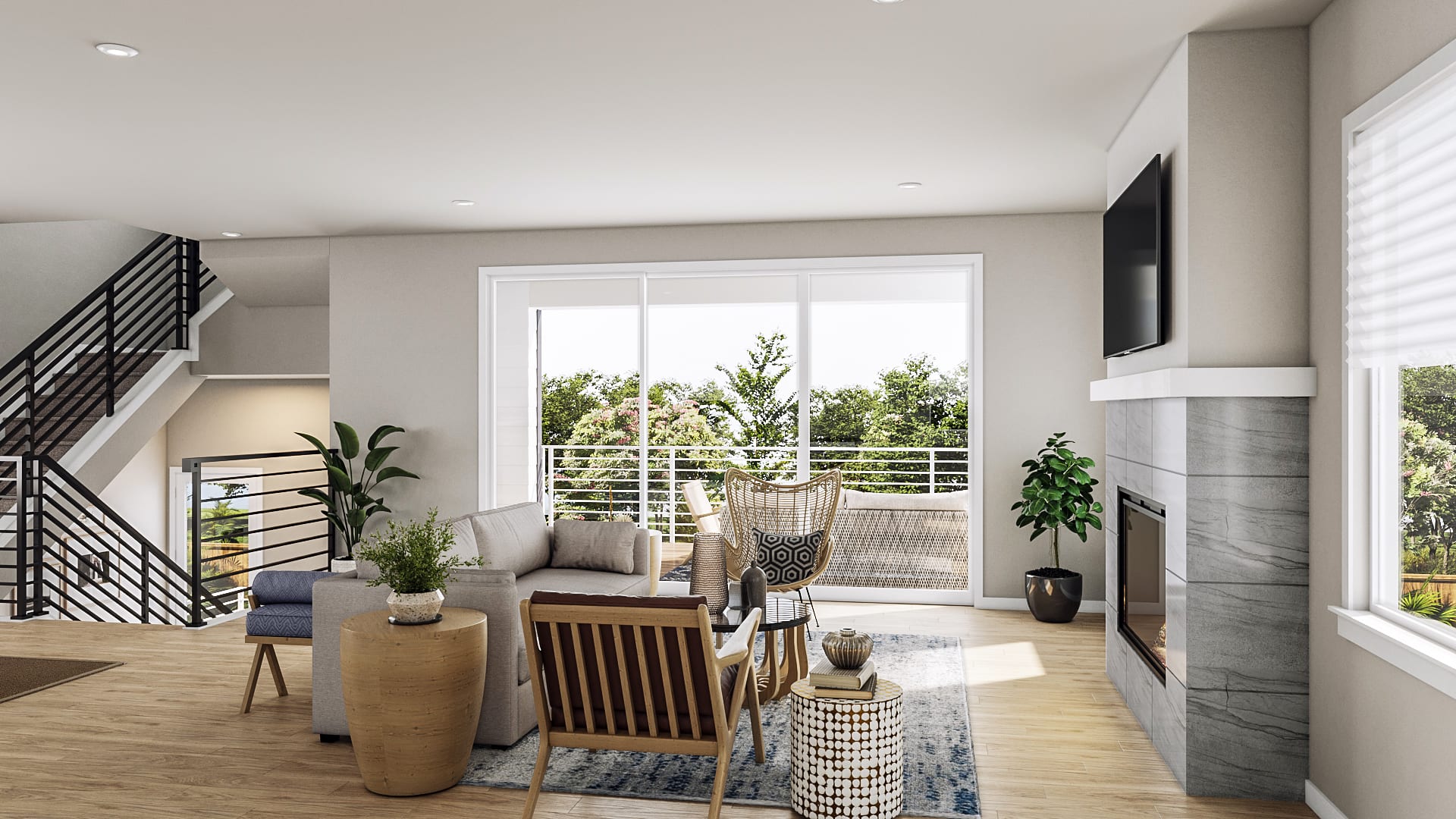 A modern and cozy living room with large windows overlooking a lush outdoor area, featuring a mix of wooden and metal furnishings, potted plants, and a television mounted on the wall.
