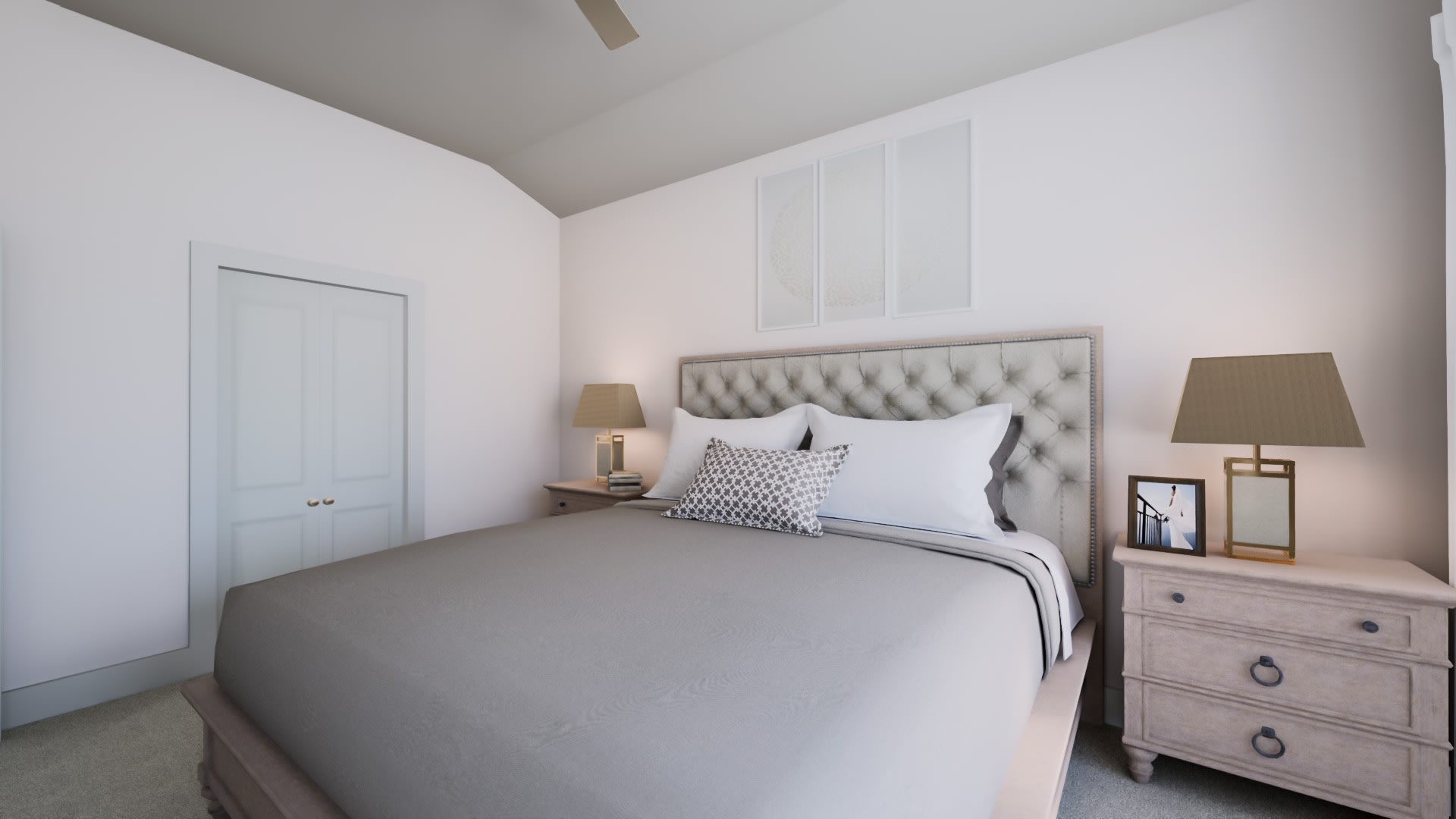 A cozy and well-designed bedroom with a tufted headboard, neutral-colored bedding, and a pair of nightstands with lamps, set against a plain white wall background.