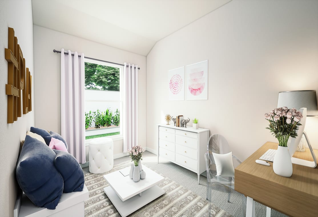 A cozy and bright living room with a white dresser, a coffee table, and a large window overlooking a lush outdoor area.