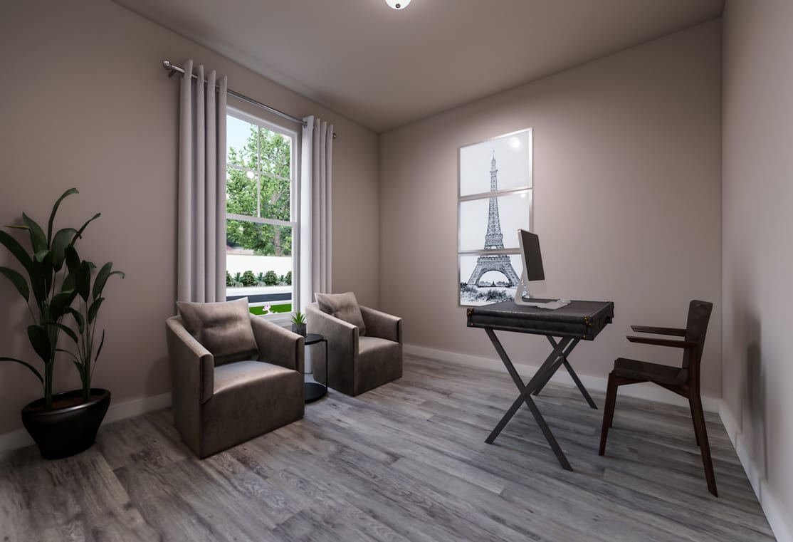 A cozy and modern home office space with a large window overlooking a lush outdoor landscape, featuring a desk with an Eiffel Tower figurine and comfortable armchairs.