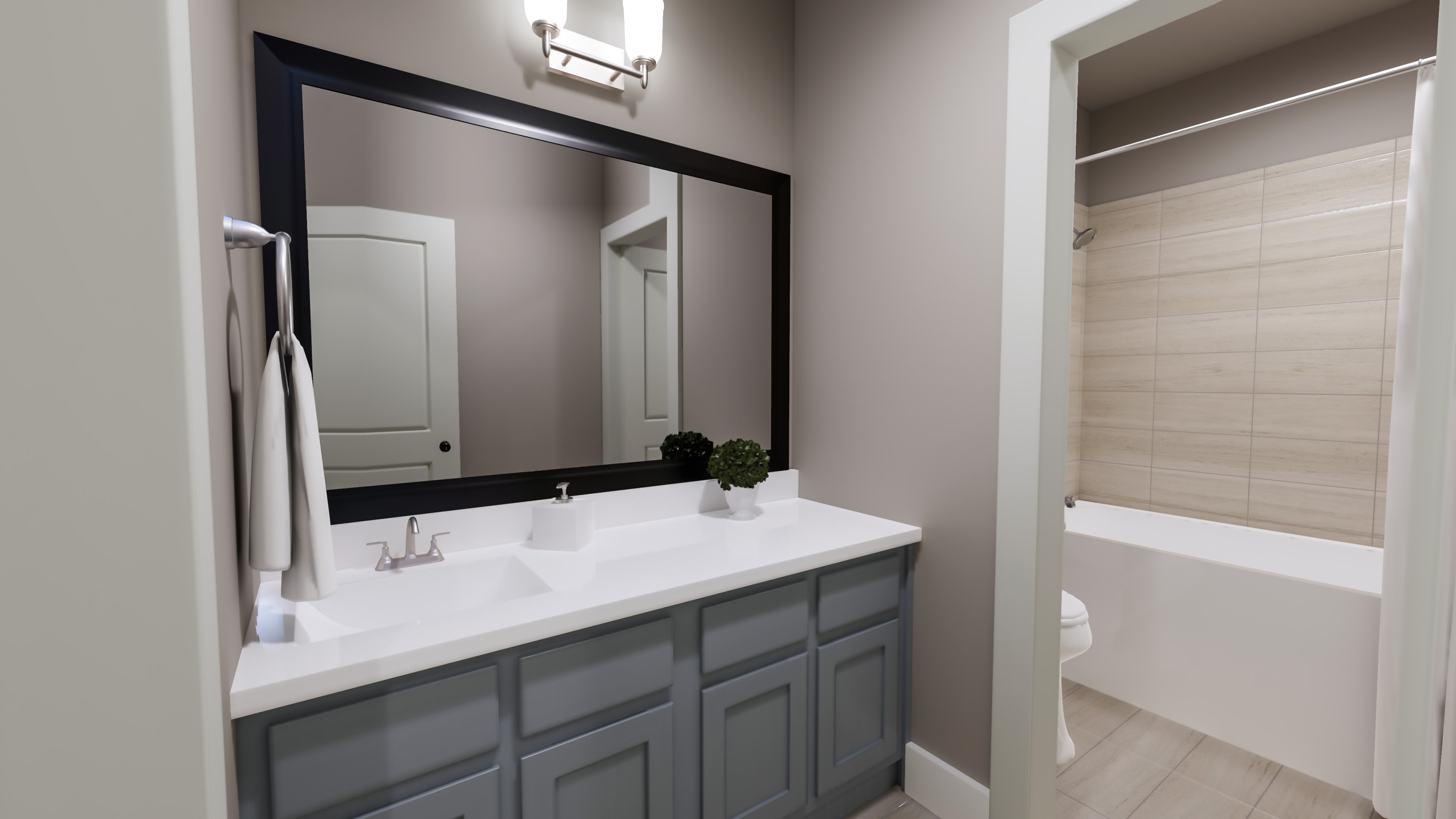 A modern bathroom with a vanity, mirror, and a bathtub visible in the background.