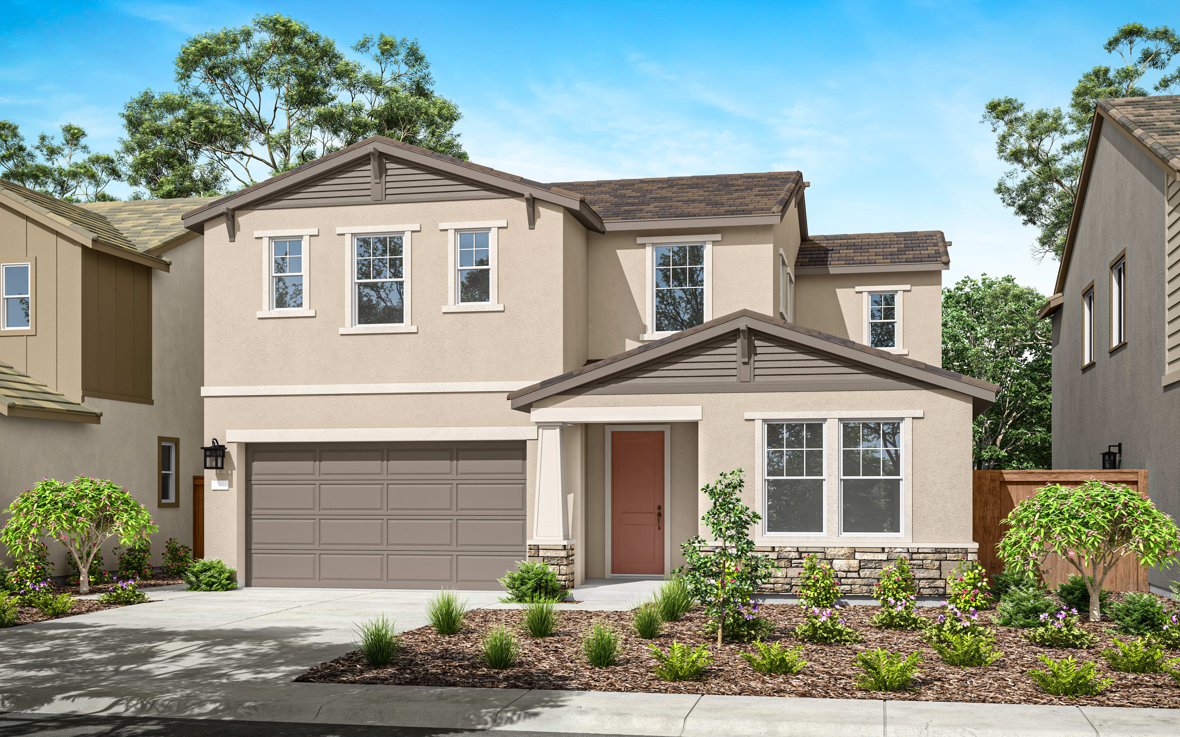 A two-story residential house with a garage, surrounded by trees and landscaping, set against a clear blue sky.