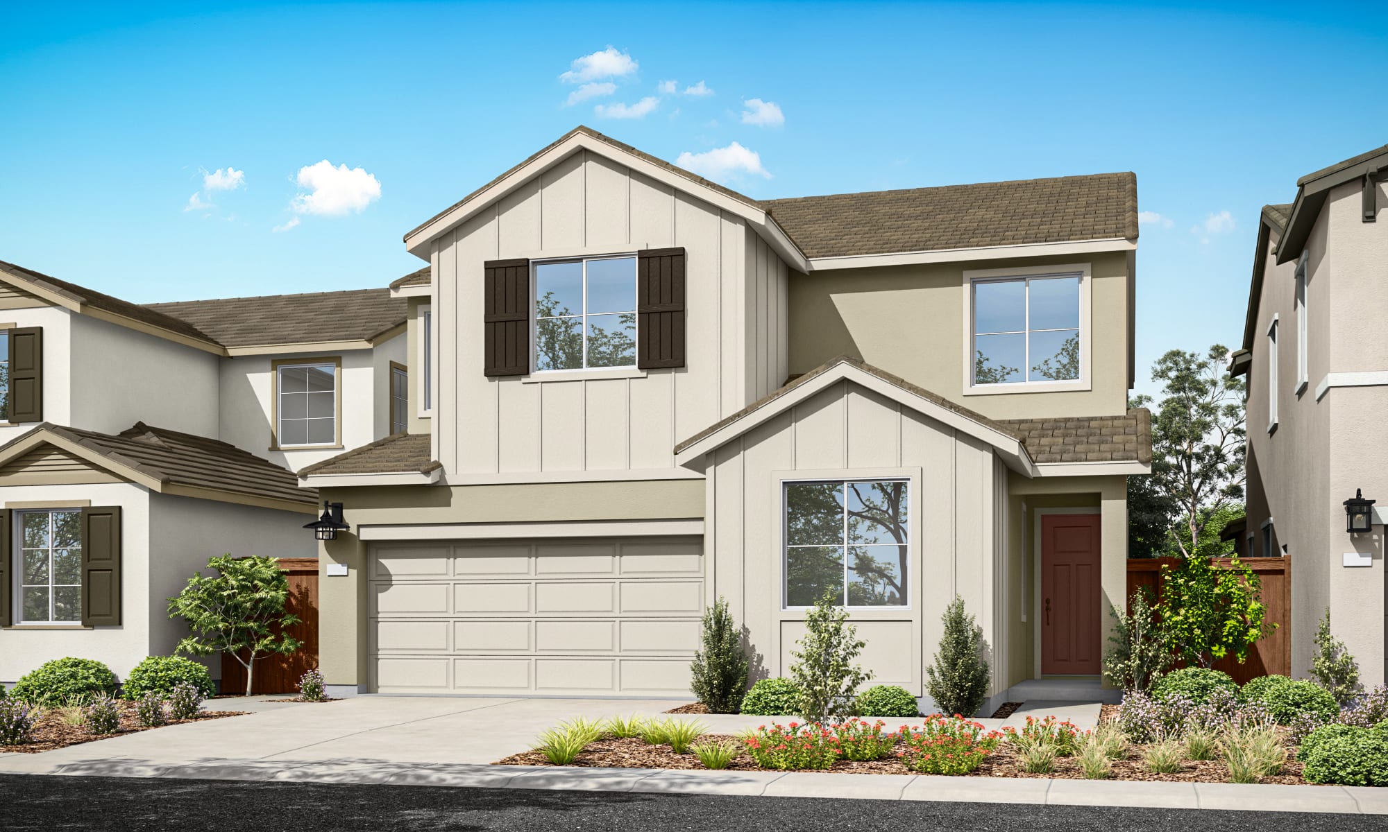 A two-story residential house with a garage, surrounded by landscaped gardens and a clear blue sky in the background.