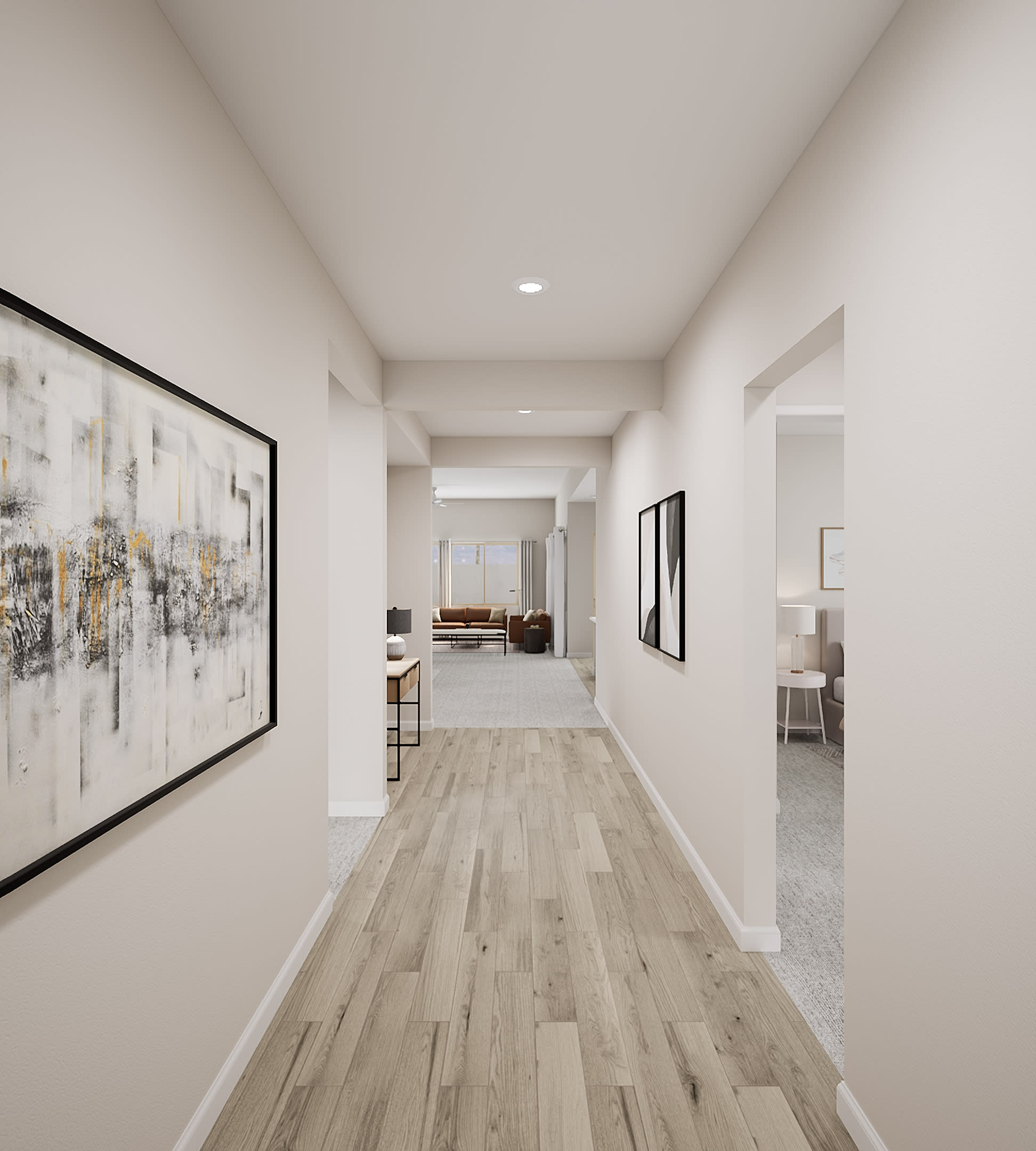A spacious and minimalist hallway with a large abstract painting on the wall, leading to a living room area with a couch and other furnishings.
