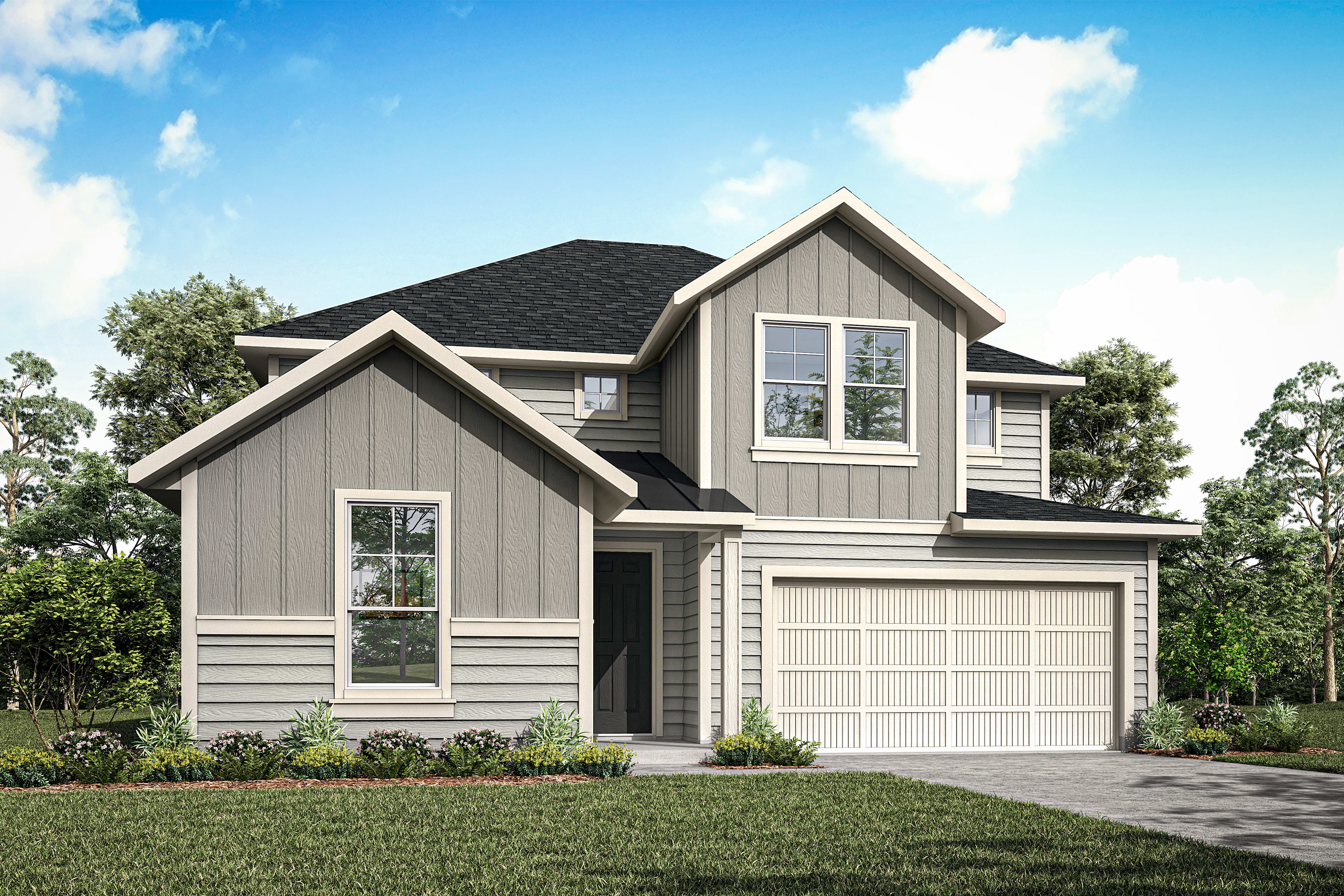 A two-story house with a gray exterior, a black roof, and a garage door stands in a grassy area surrounded by trees against a blue sky with white clouds.