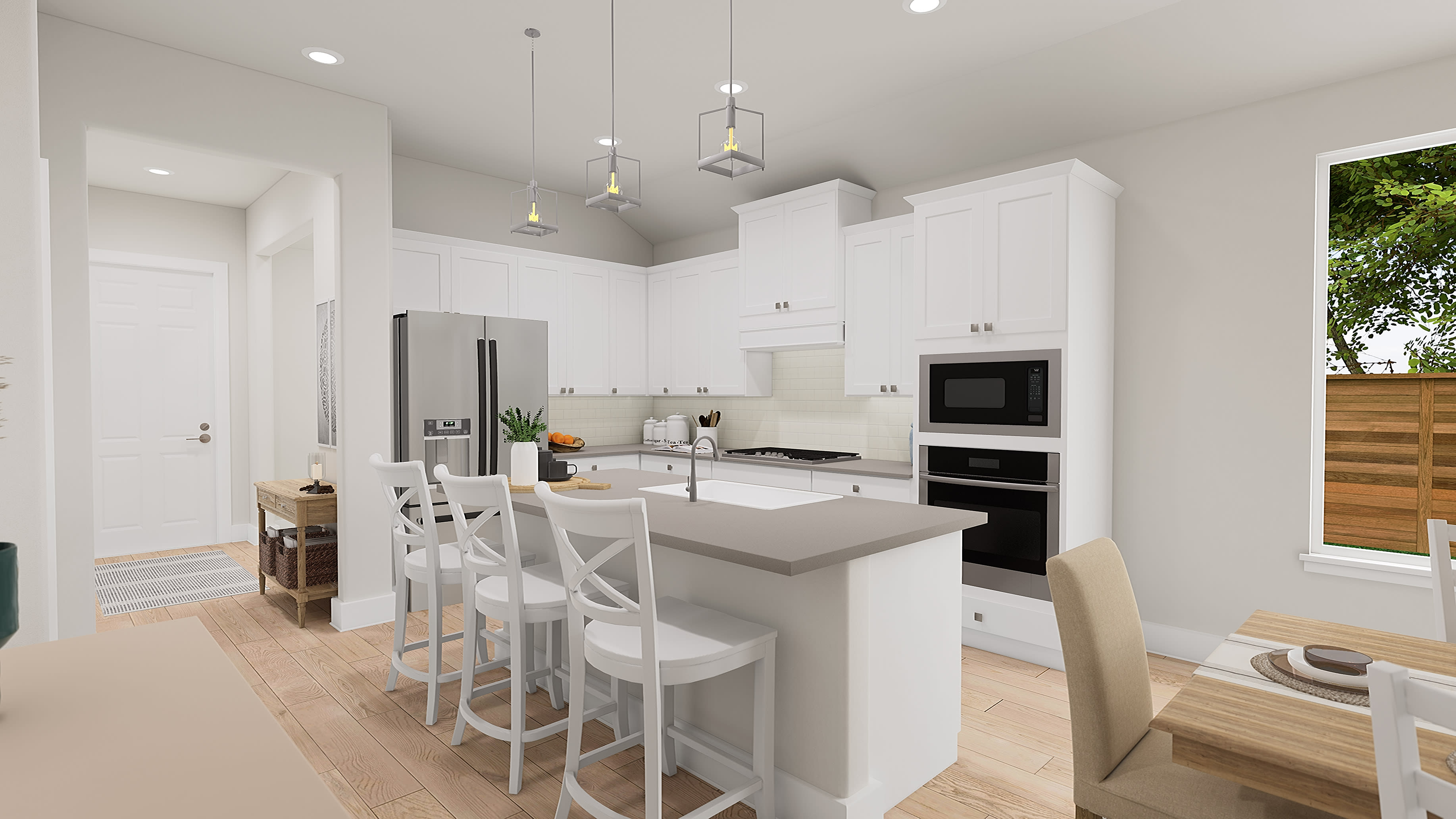 A modern, bright kitchen with white cabinets, a central island, and pendant lighting, set against a backdrop of a wooden fence and greenery visible through a window.
