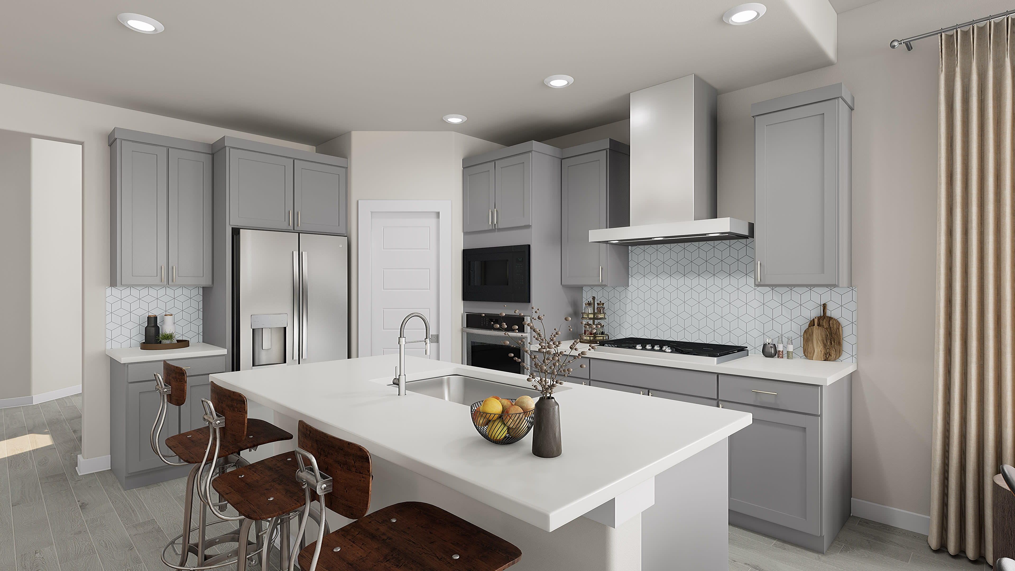 A modern, well-equipped kitchen with light gray cabinets, a white countertop, and various kitchen appliances and accessories on the counter.