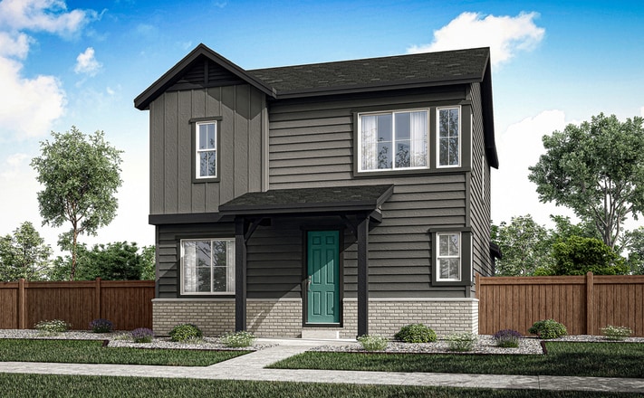 A two-story gray wooden house with a green front door, surrounded by a wooden fence and lush greenery in the background.