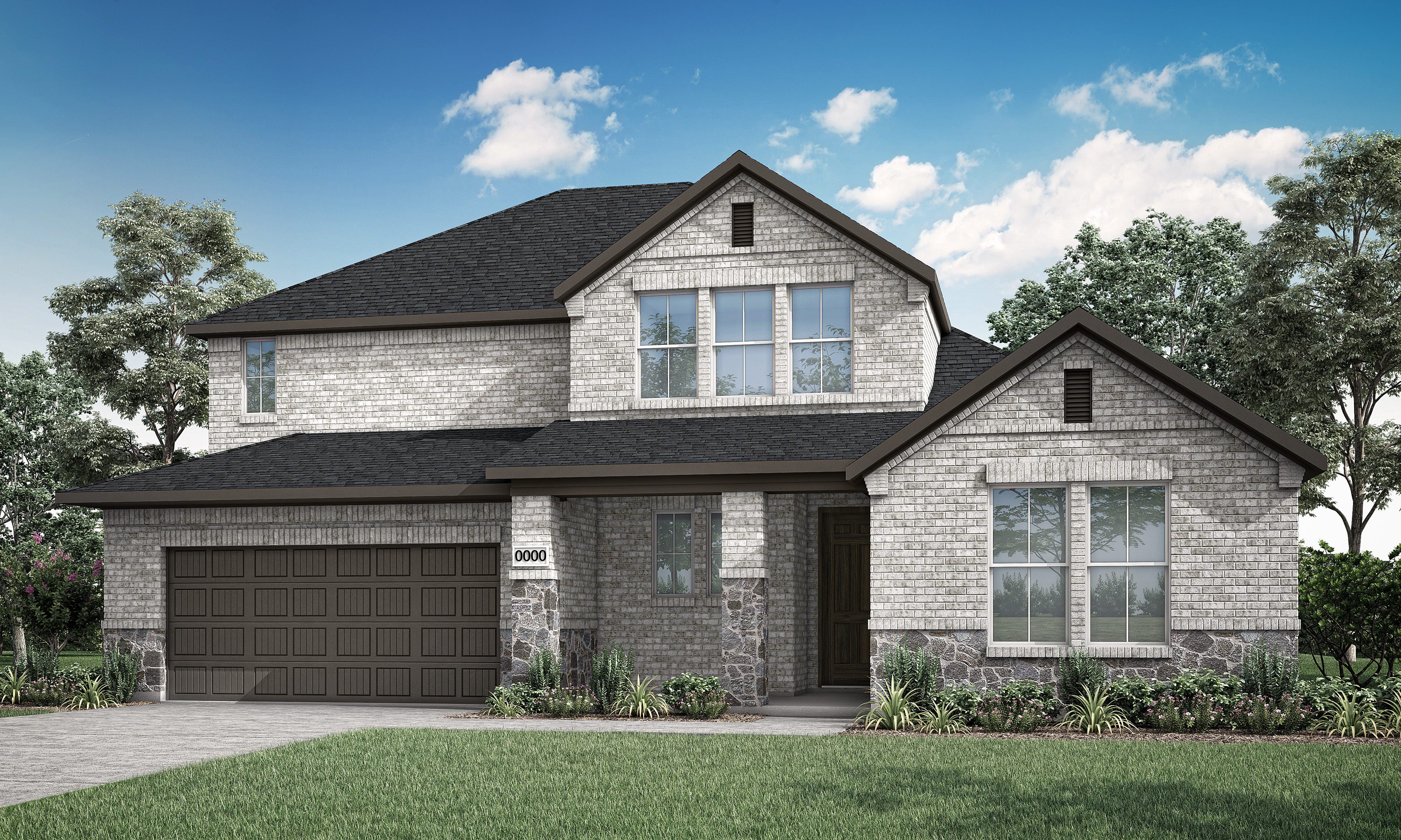 A two-story gray stone house with a garage, surrounded by lush greenery and a clear blue sky with fluffy white clouds.