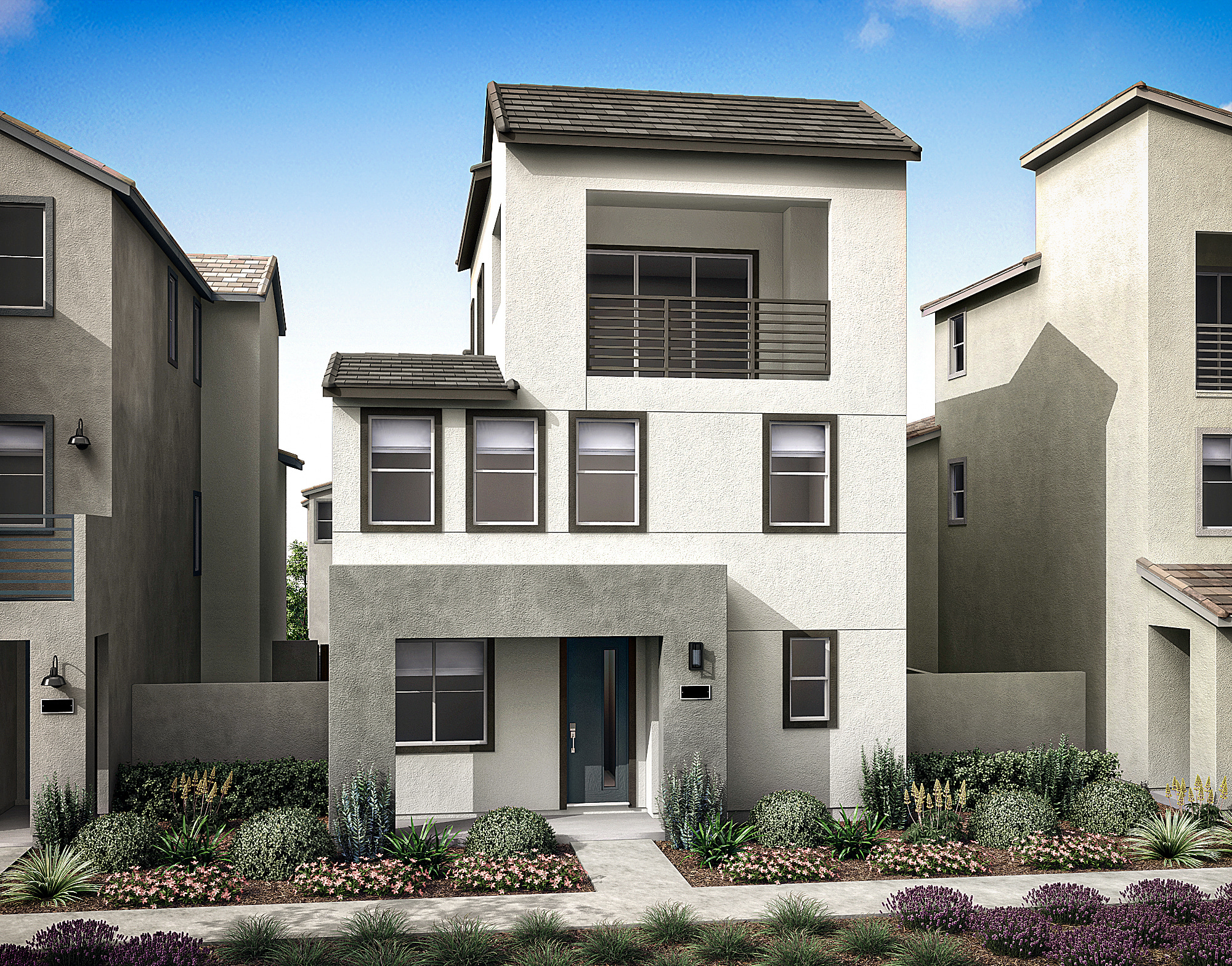 A modern, multi-story residential building with a gray exterior, a tiled roof, and a well-landscaped front yard featuring various plants and shrubs.