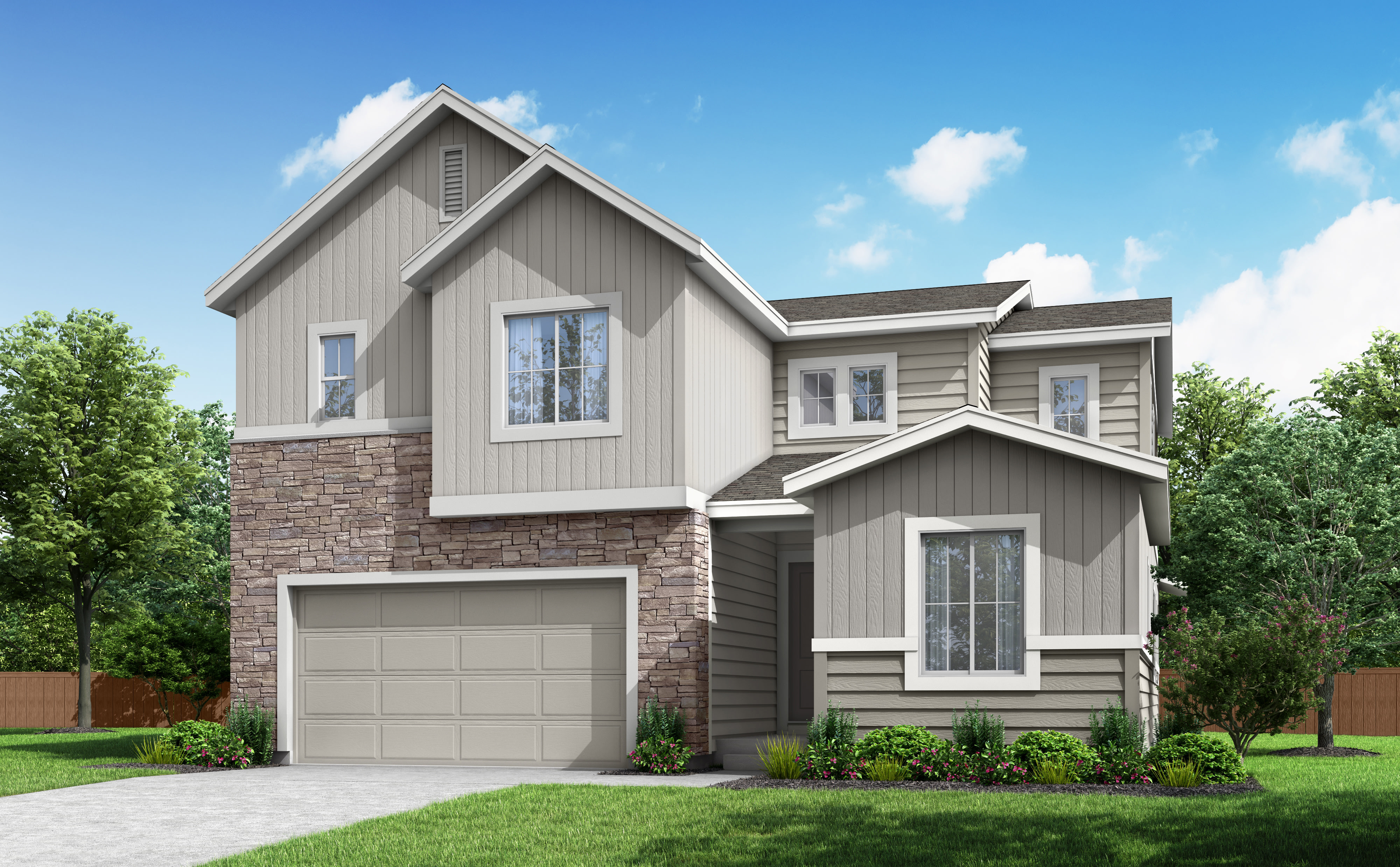 A two-story gray and stone house with a garage, surrounded by lush greenery and a clear blue sky.