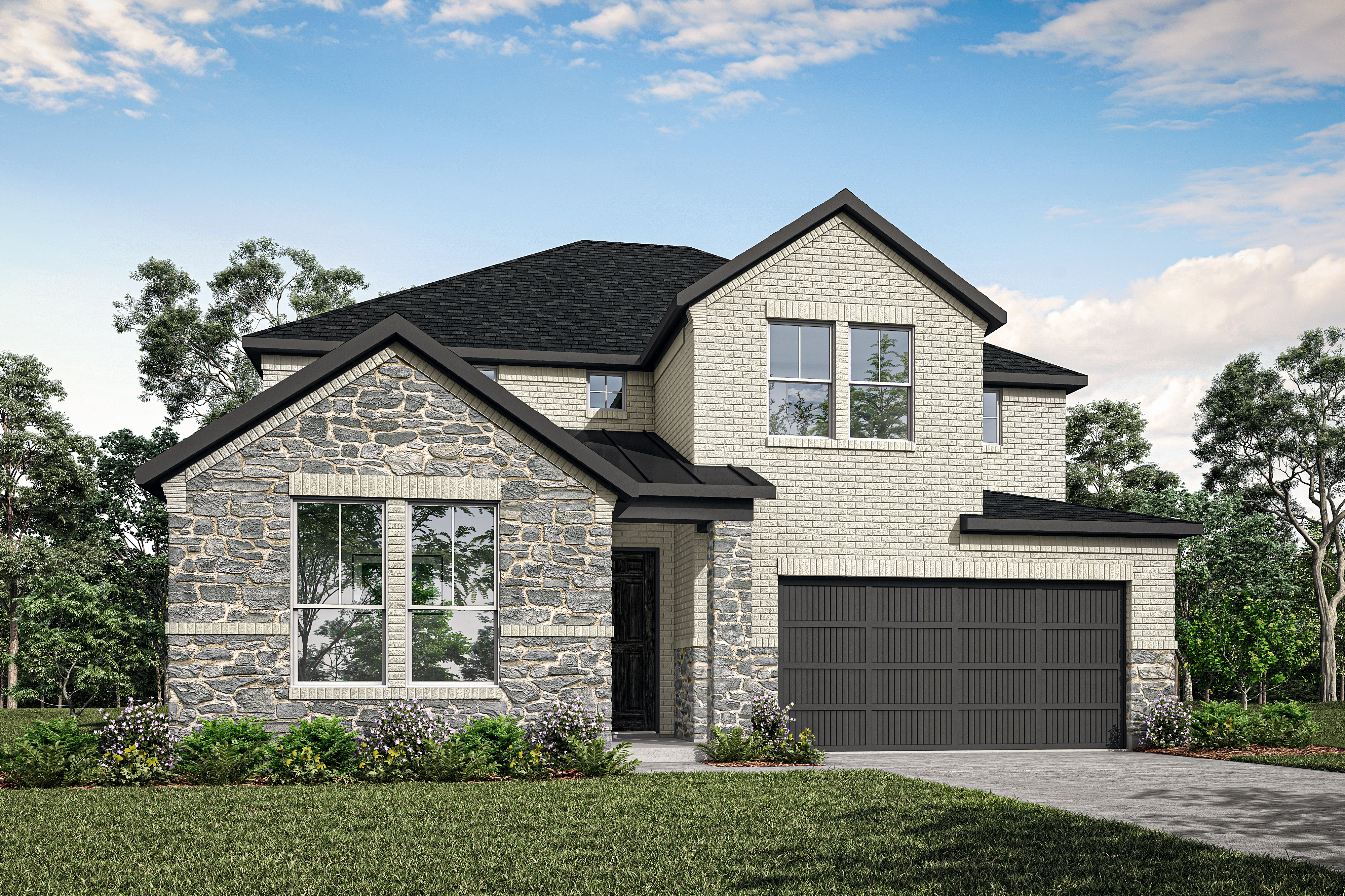 A two-story house with a stone exterior, a black roof, and a garage door stands in a grassy area surrounded by trees.