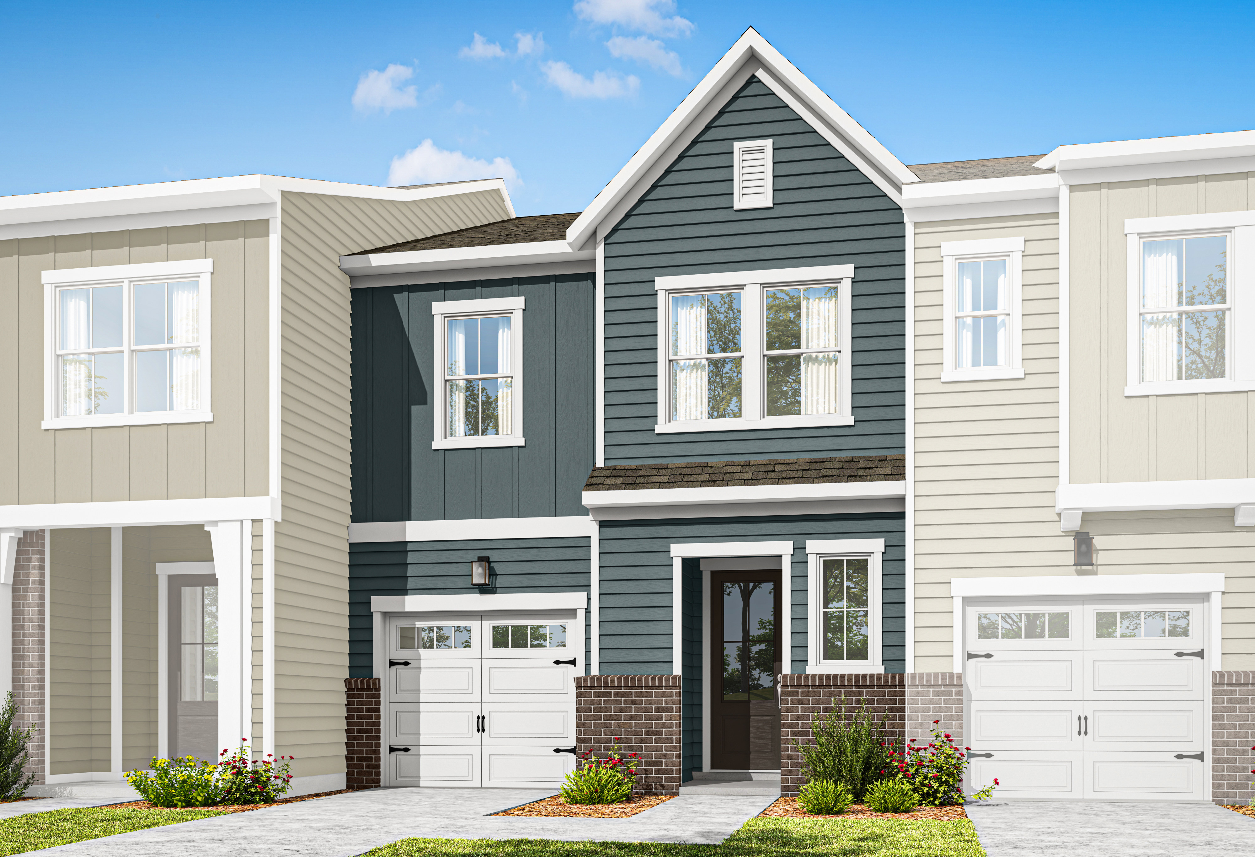 A two-story townhouse with a gray exterior, white trim, and a brick foundation sits in a well-manicured yard against a clear blue sky with scattered clouds.