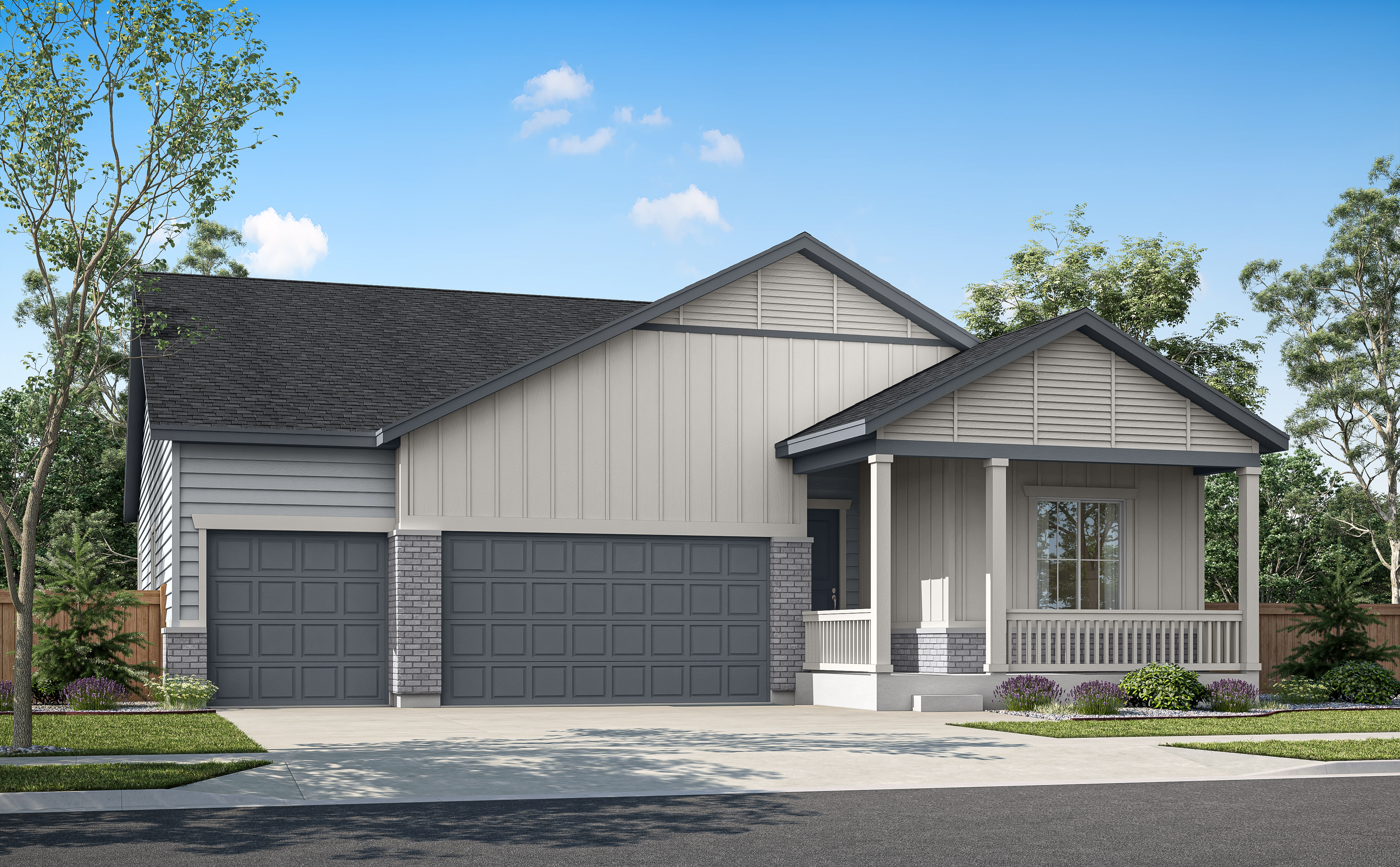 A two-story gray house with a porch, a garage, and a driveway, surrounded by trees and a clear blue sky.