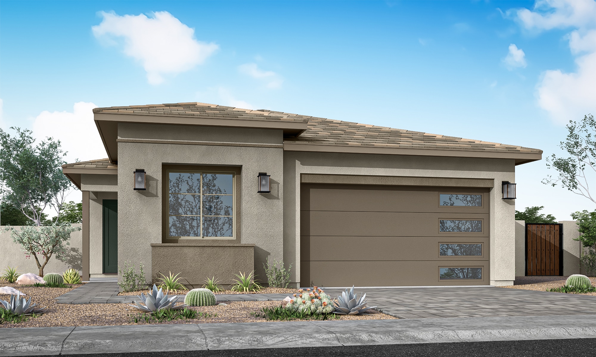 A modern stucco house with a garage and desert landscaping sits under a cloudy blue sky.