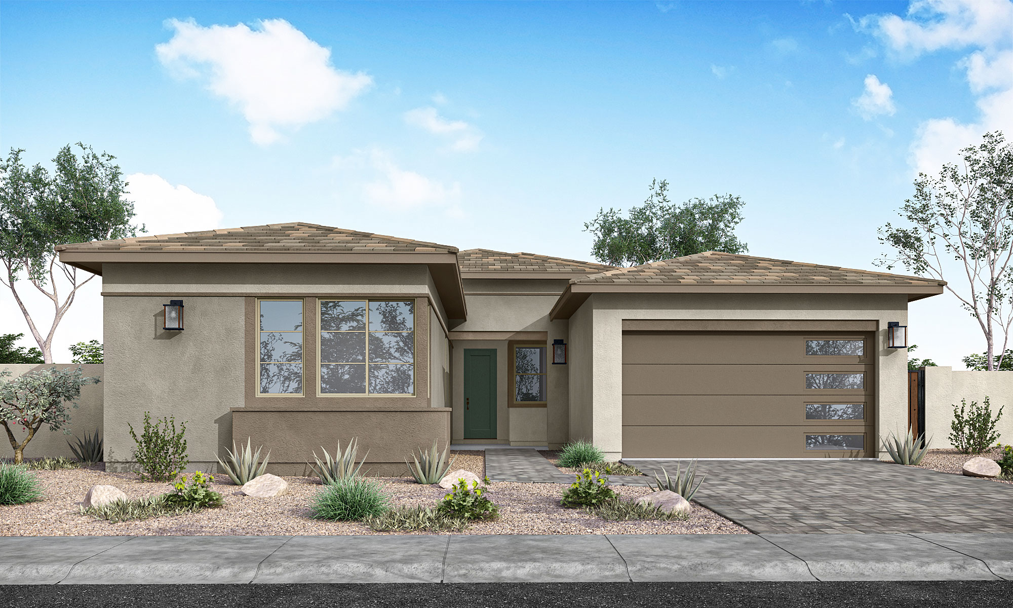 A modern stucco house with a beige exterior and a large garage door sits behind a low-maintenance desert landscape, under a partly cloudy sky.