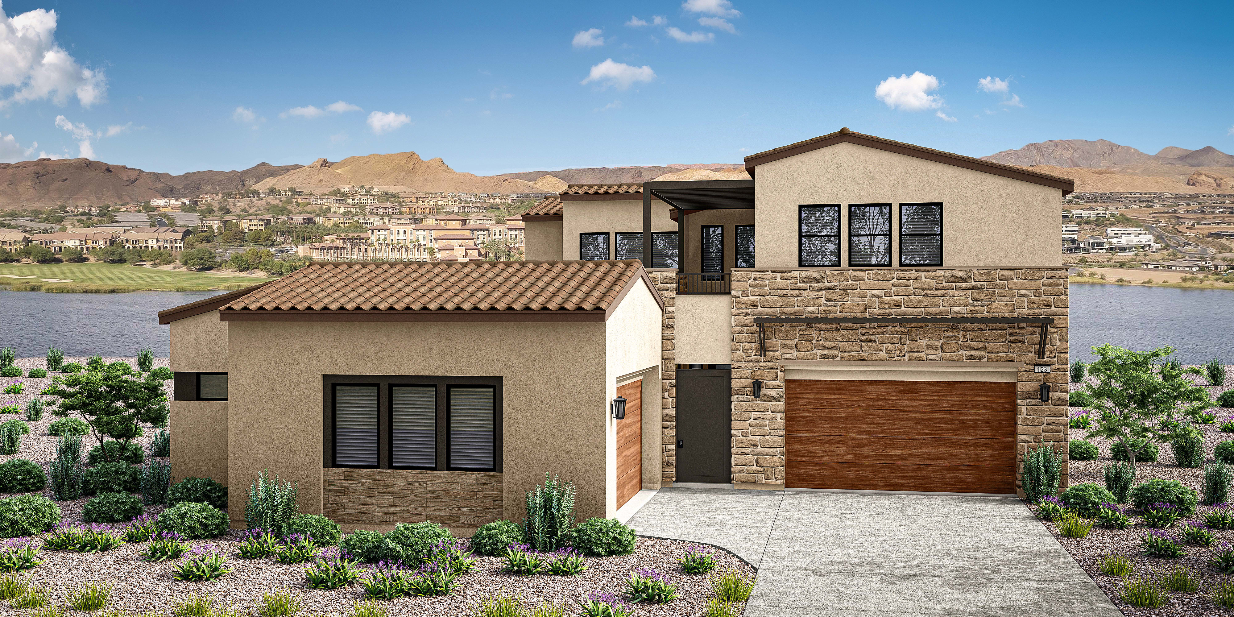 A two-story Mediterranean-style house with a tiled roof, stone and stucco exterior, and a wooden garage door sits in the foreground, surrounded by lush landscaping and overlooking a mountainous desert landscape in the background.