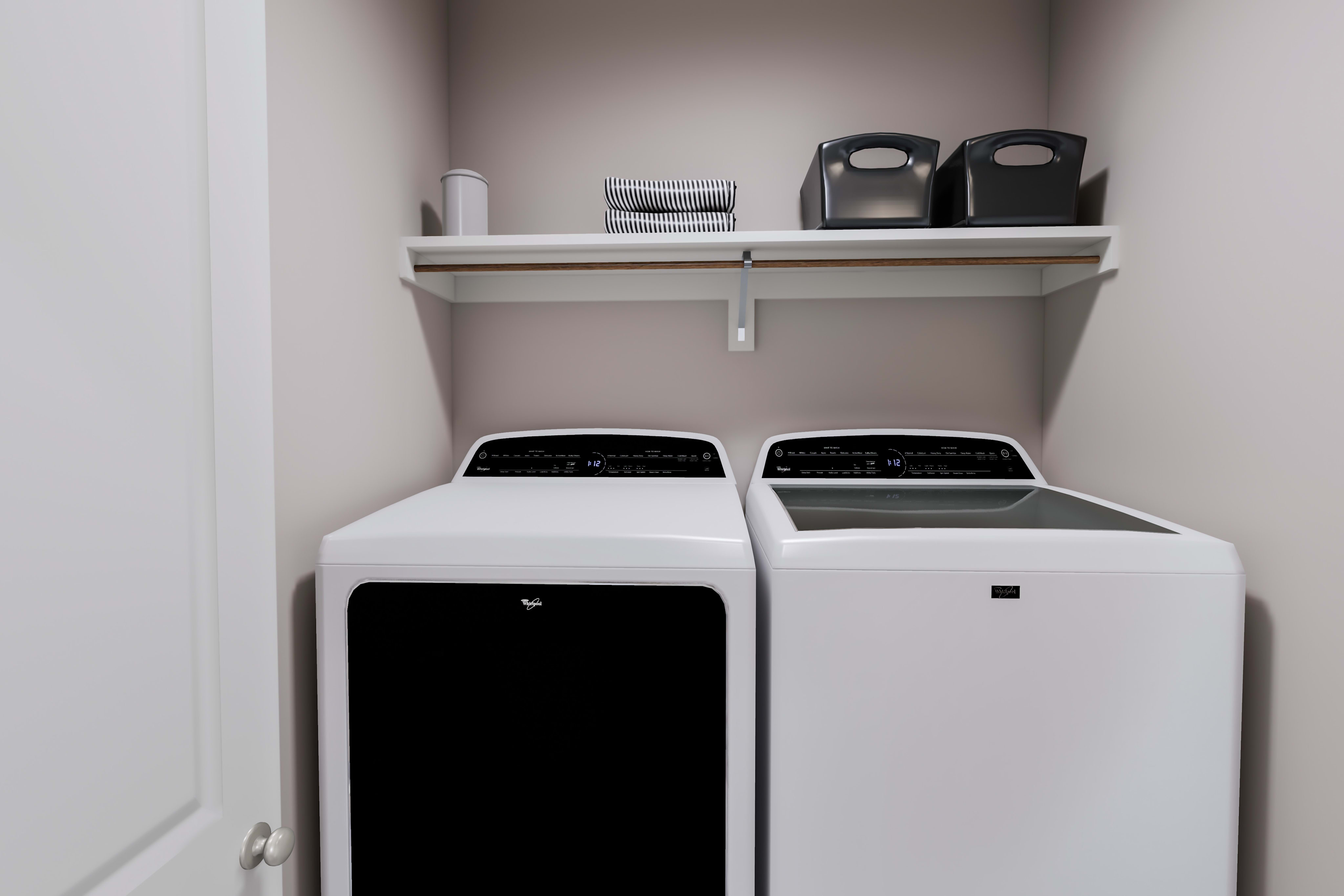 The image shows a laundry room with two white washing machines in the foreground, and a shelf above them holding various household items.