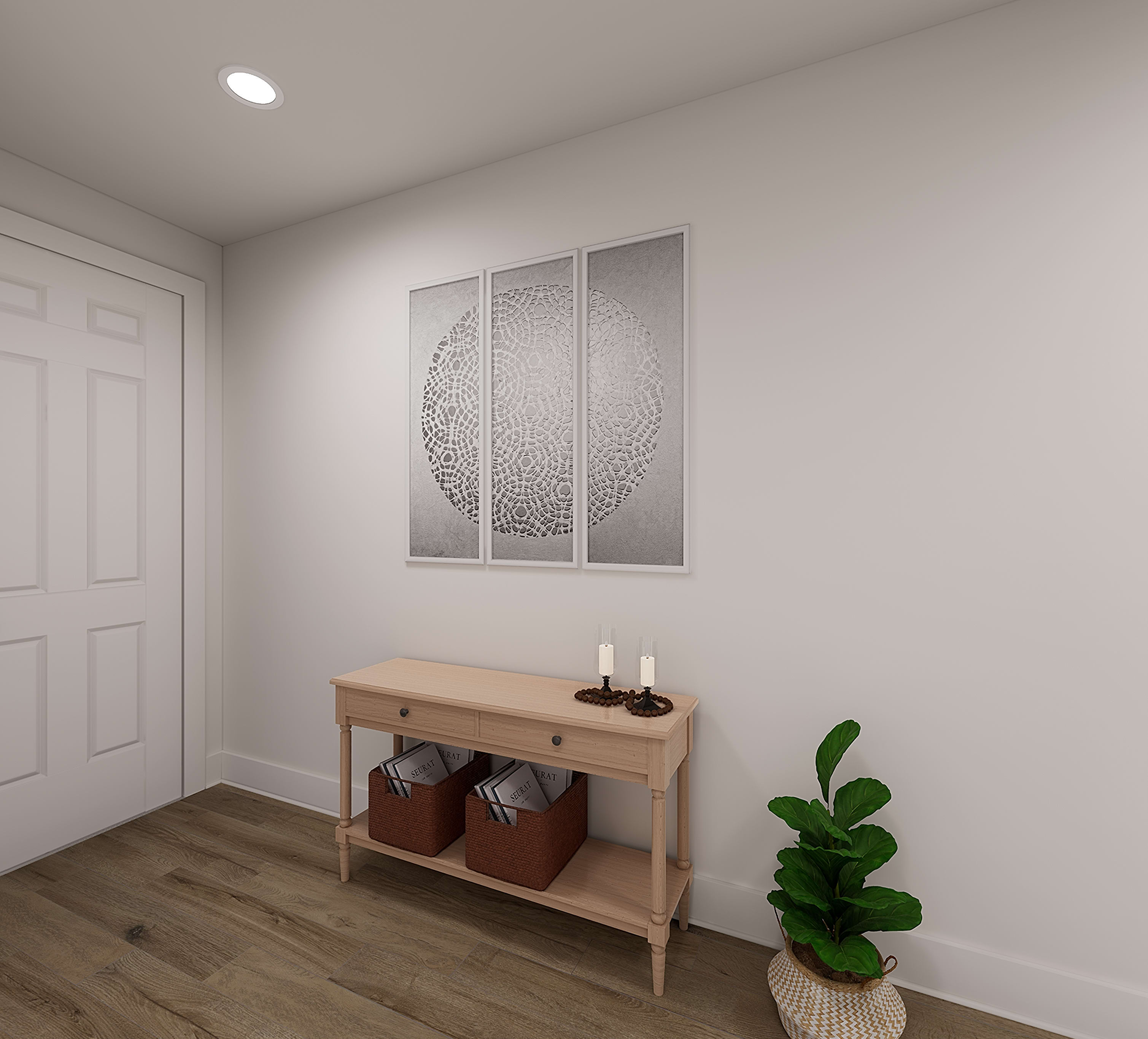A minimalist entryway with a wooden console table, decorative wall art, and a potted plant, set against a neutral-toned background.