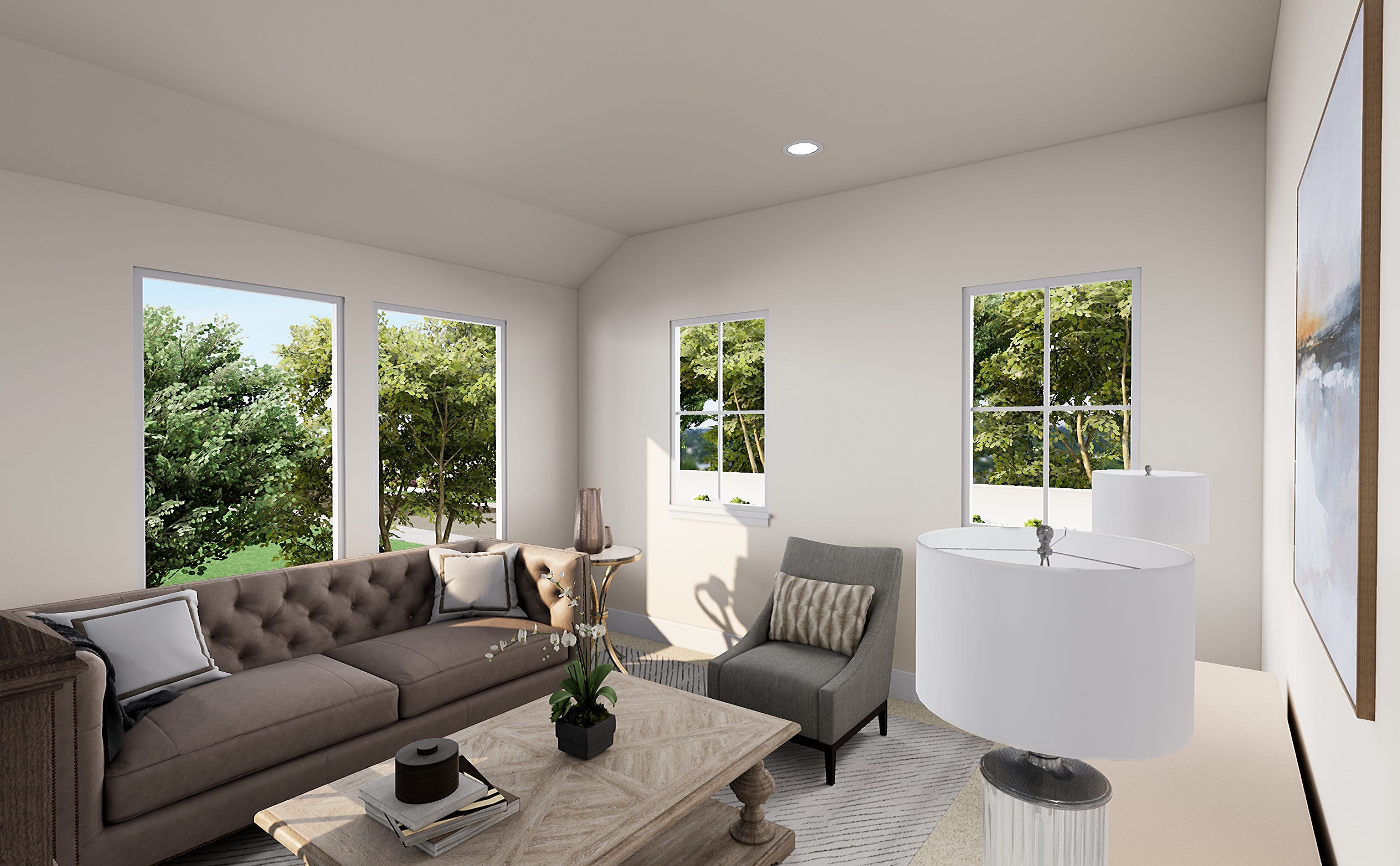 A cozy living room with large windows overlooking a lush, green outdoor space, featuring a plush gray sofa, armchairs, and a wooden coffee table.