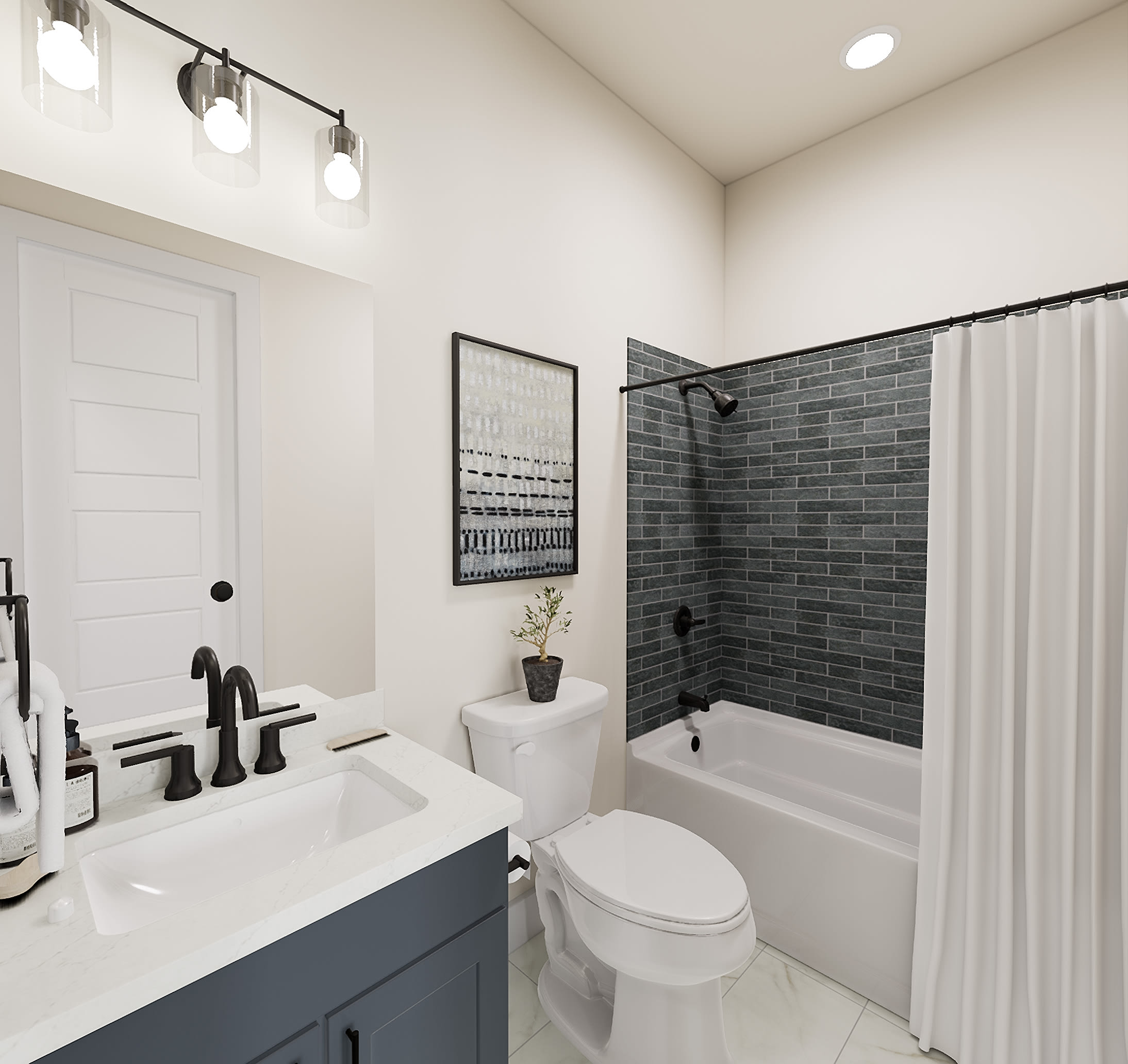 A modern bathroom features a dark blue vanity with a white sink in the foreground, and a bathtub with a dark tiled shower wall and white curtain in the background.