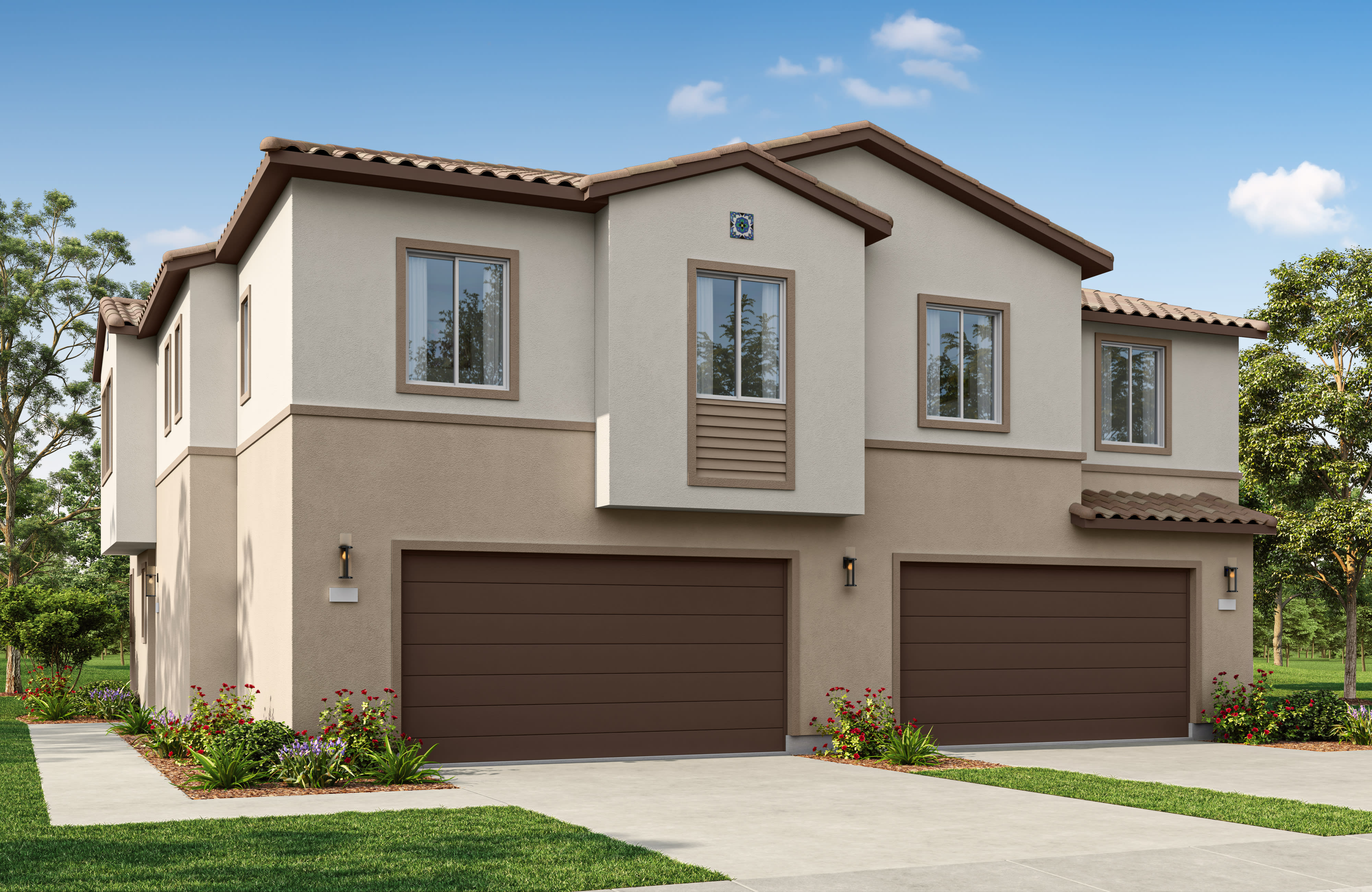 A two-story beige house with brown garage doors and a manicured lawn sits under a clear blue sky with scattered clouds.