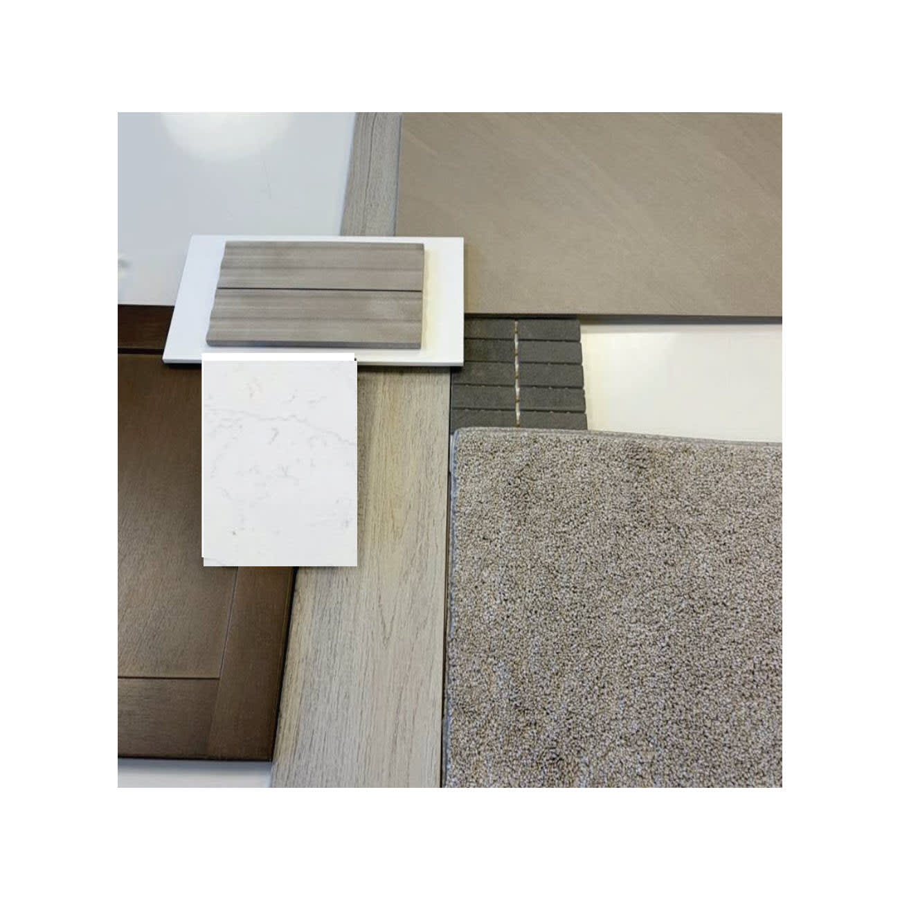 Various material samples, including marble, wood, and carpet, are layered in the foreground against a neutral background of larger flooring panels.