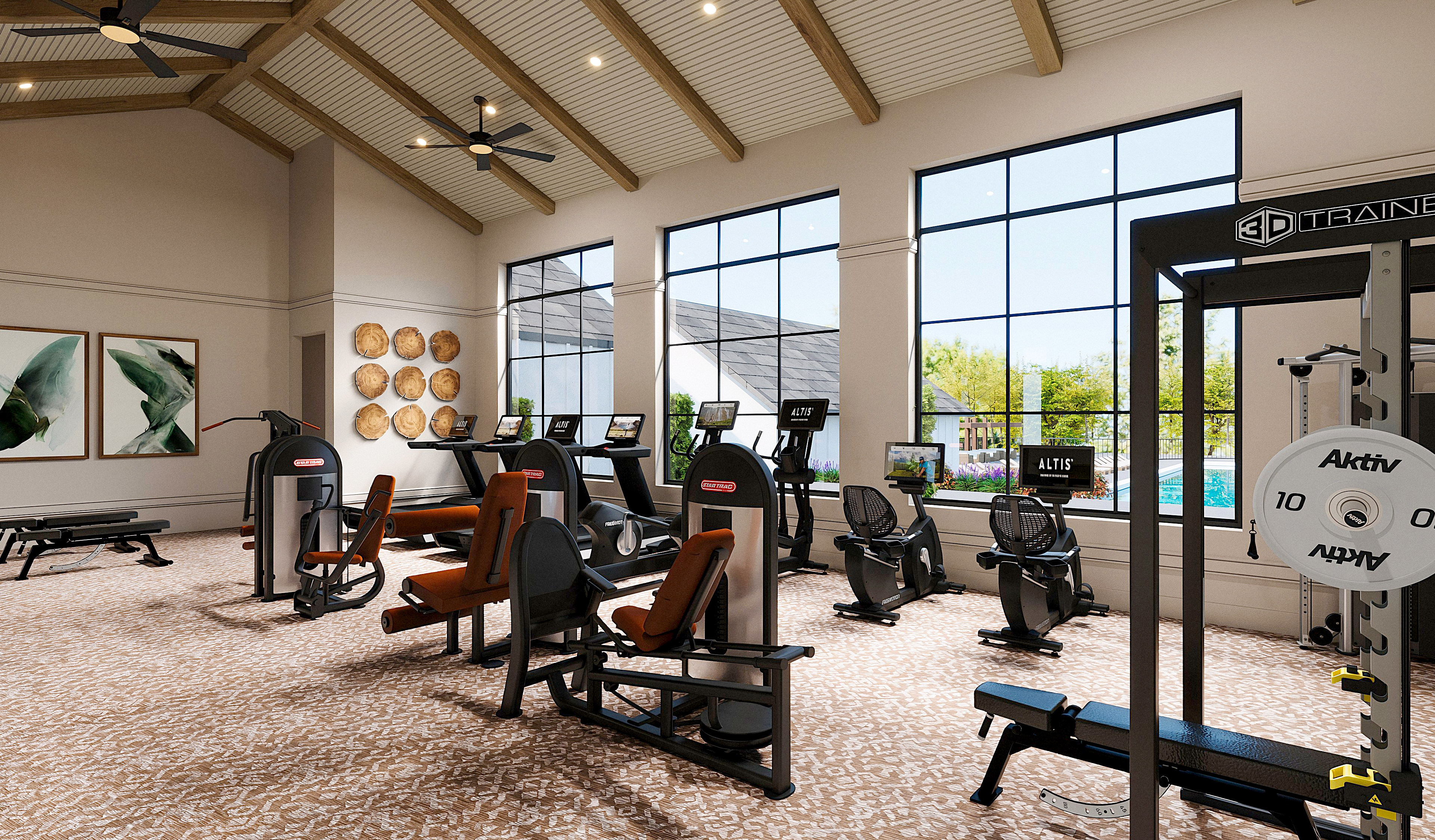 A spacious and well-equipped gym with various exercise equipment, high ceilings, and large windows providing natural light, set against a backdrop of artwork and decor.