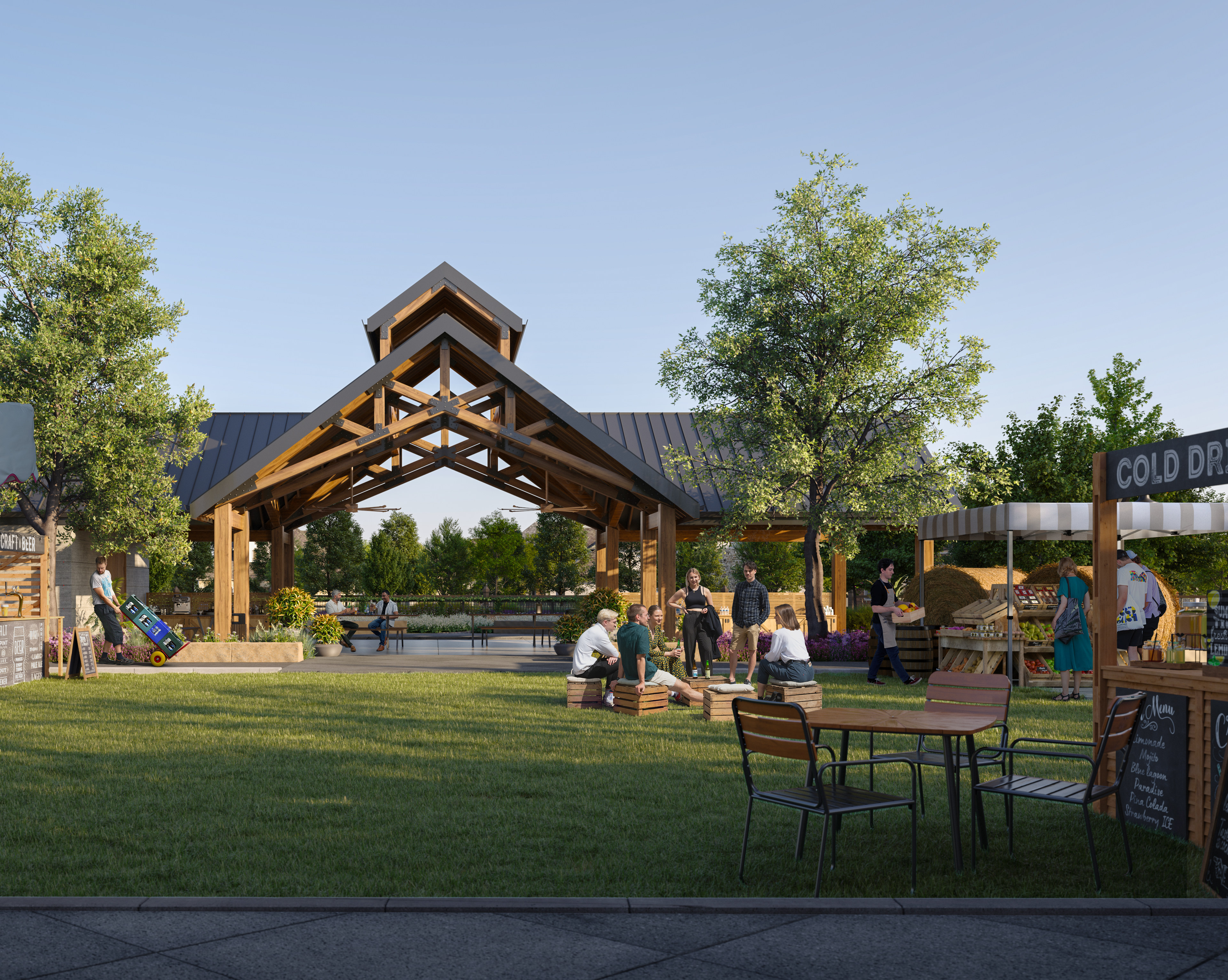 A grassy outdoor area with a wooden archway structure, surrounded by trees and people browsing various stalls or displays.