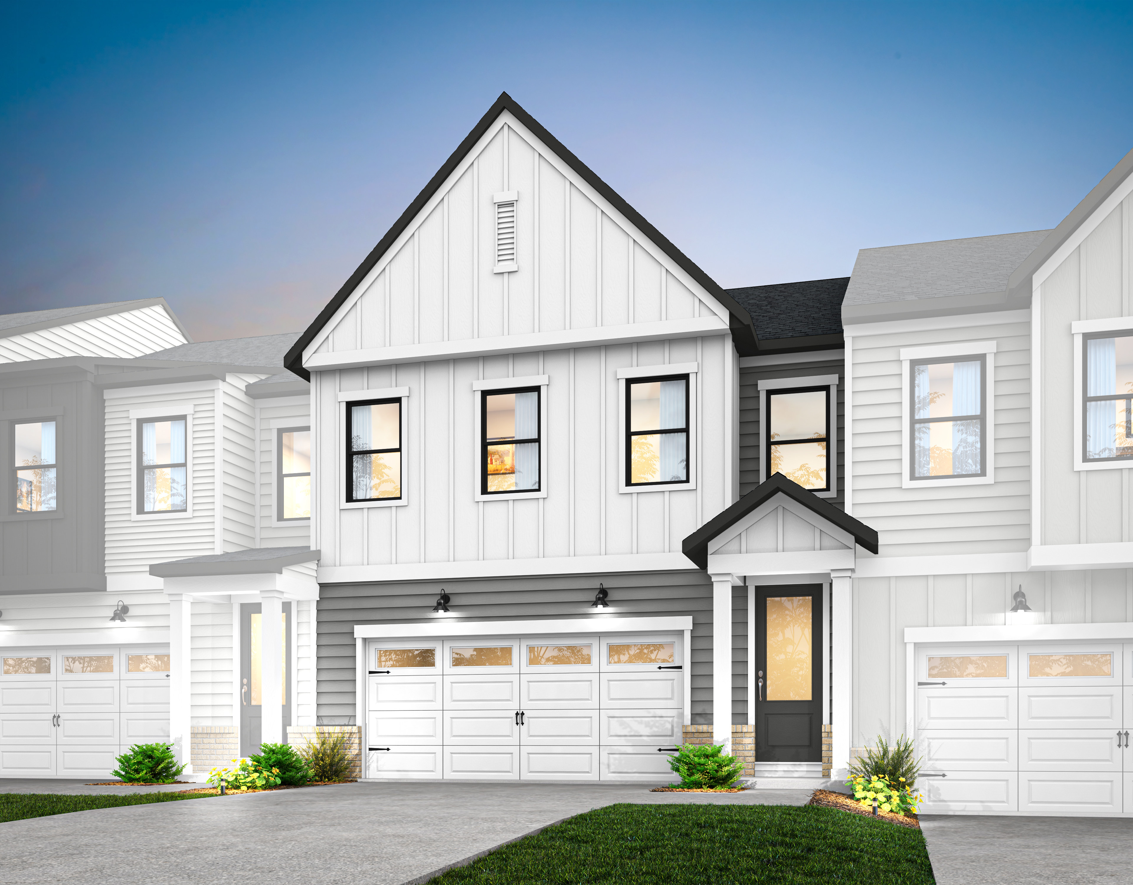 A modern, two-story townhouse with a white exterior, black trim, and a prominent gable roof stands in the foreground, surrounded by a well-manicured lawn and landscaping.