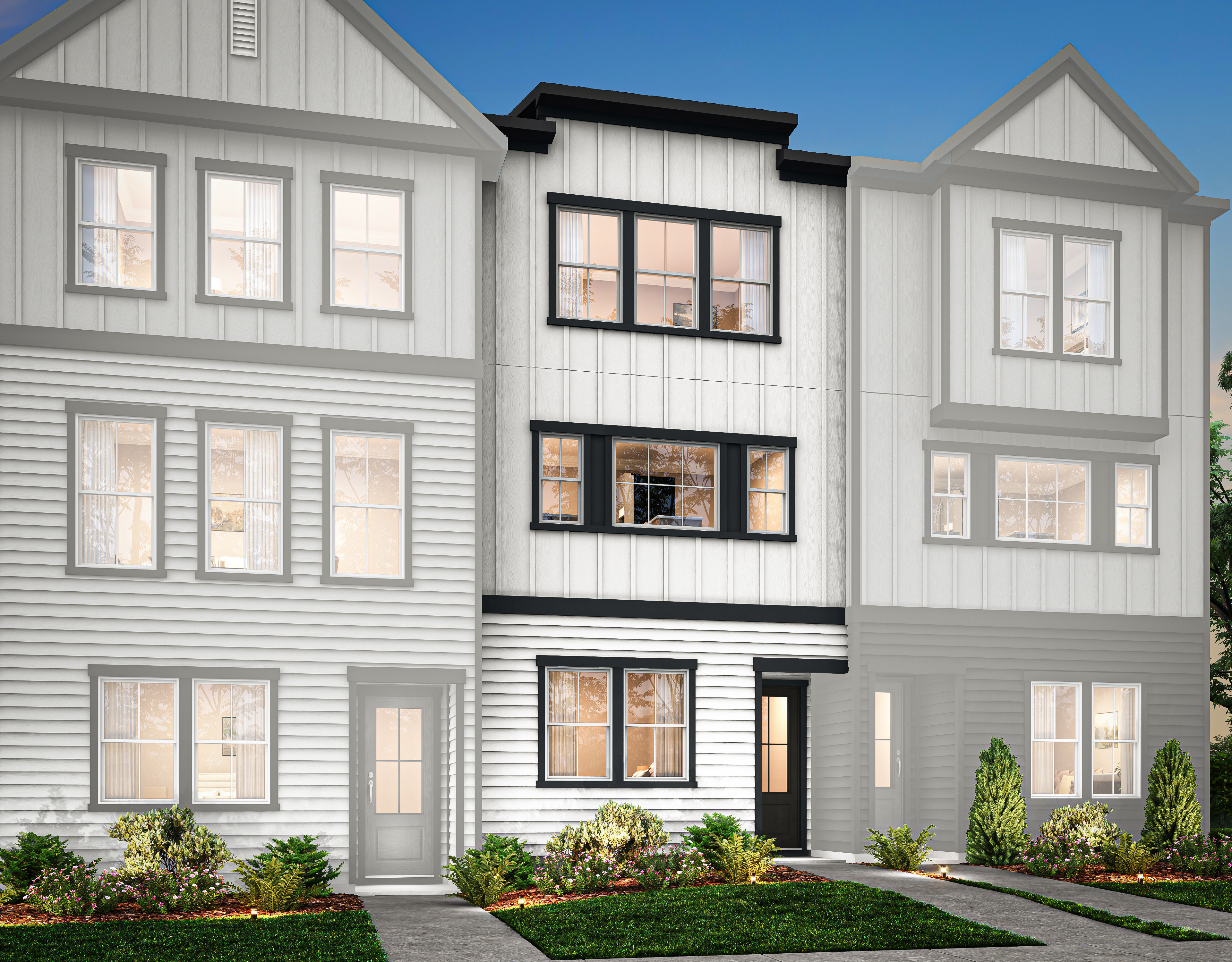 A modern, multi-story townhouse with a gray exterior, large windows, and a well-landscaped front yard surrounded by trees and shrubs.