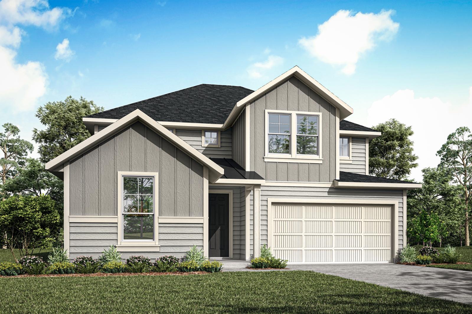 A two-story house with a gray exterior, a black roof, and a garage door stands in a grassy area surrounded by trees.