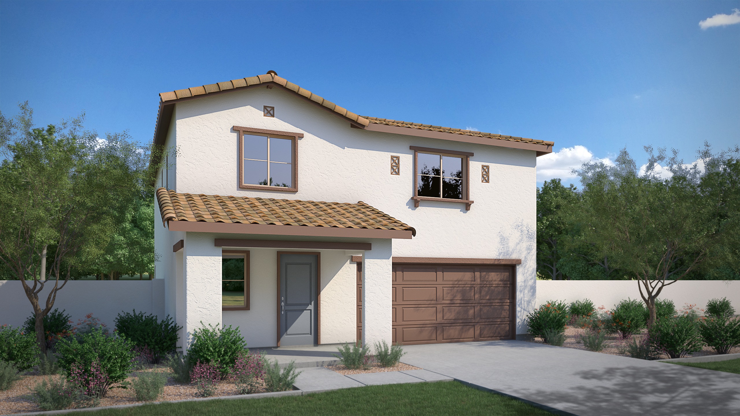 A two-story Mediterranean-style house with a tiled roof, surrounded by lush greenery and a paved driveway leading to a garage door.