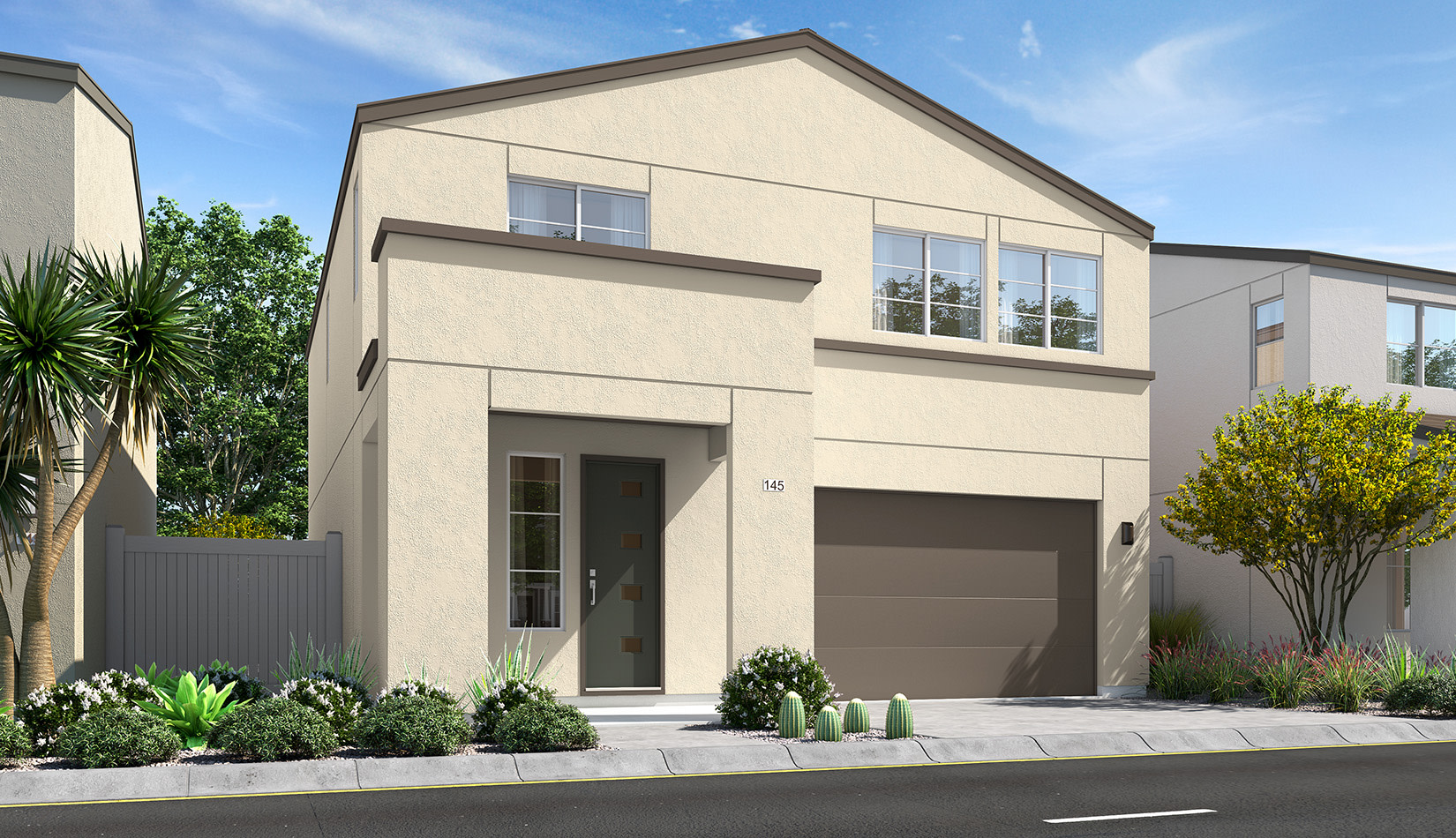 A modern two-story house with a garage, surrounded by landscaped gardens and a paved driveway, set against a clear blue sky.