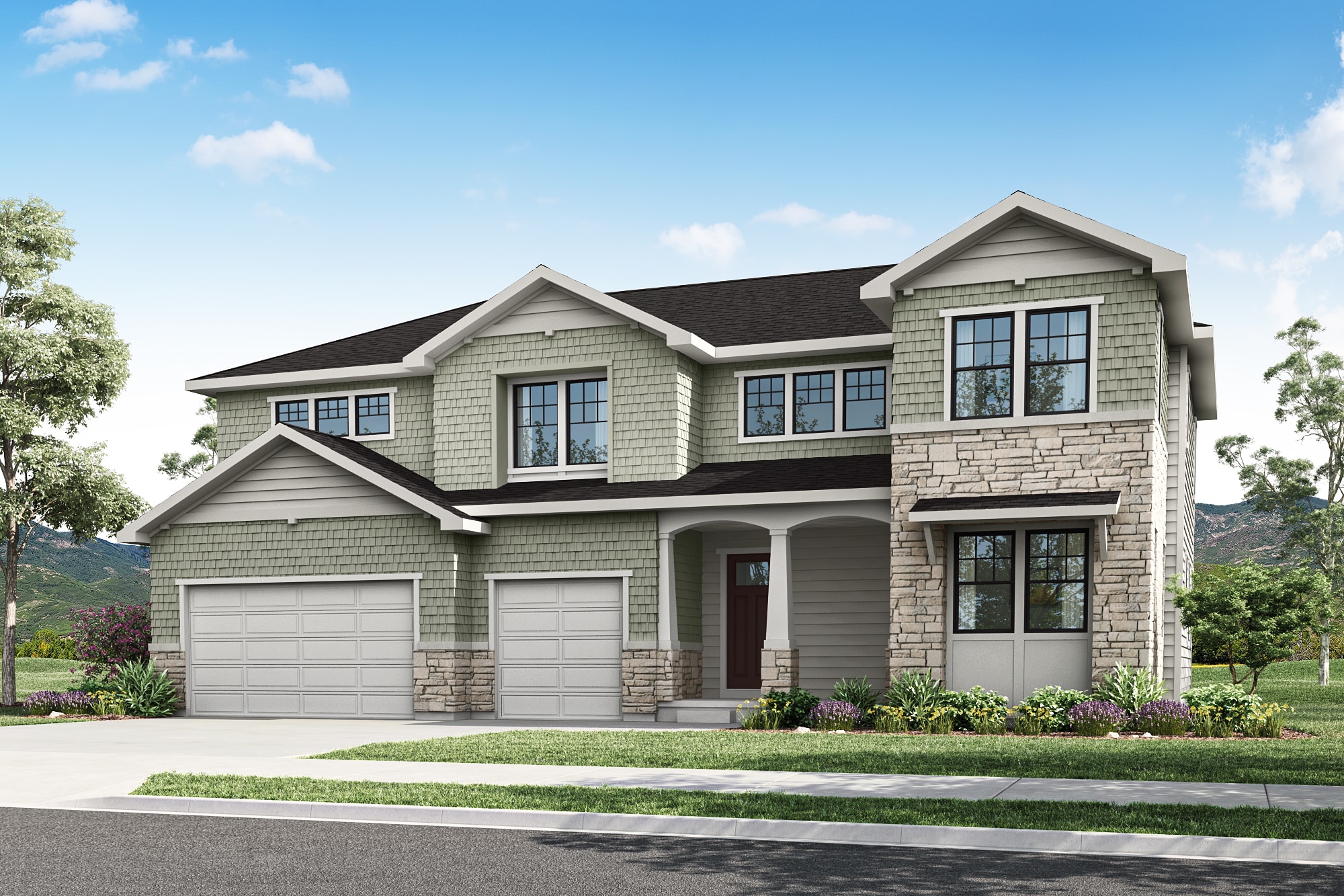 A two-story residential house with a stone exterior, a slanted roof, and a well-manicured lawn in the foreground, set against a backdrop of lush greenery and a clear blue sky.