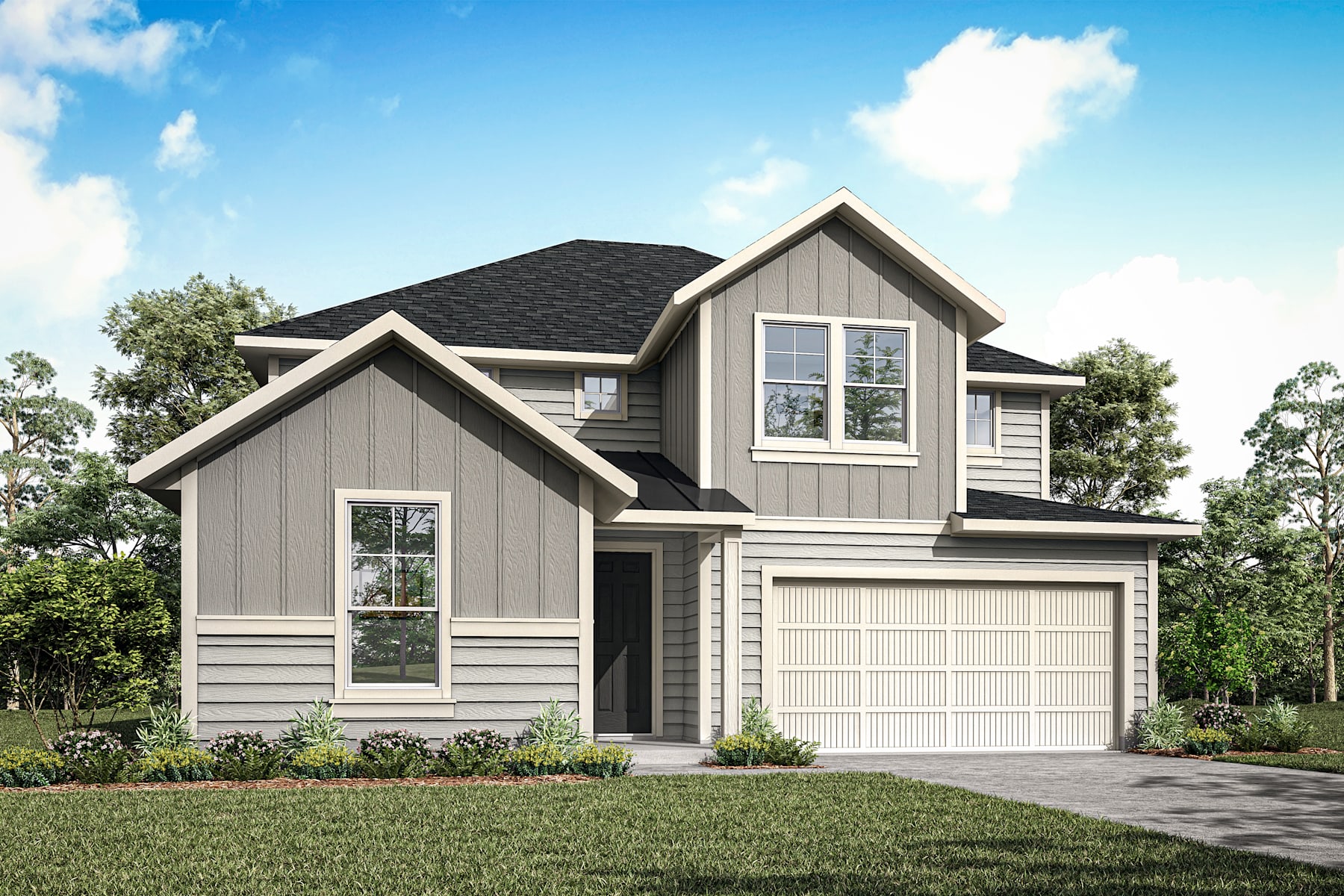 A two-story house with a gray exterior, a black roof, and a garage door stands in a grassy area surrounded by trees against a blue sky with white clouds.