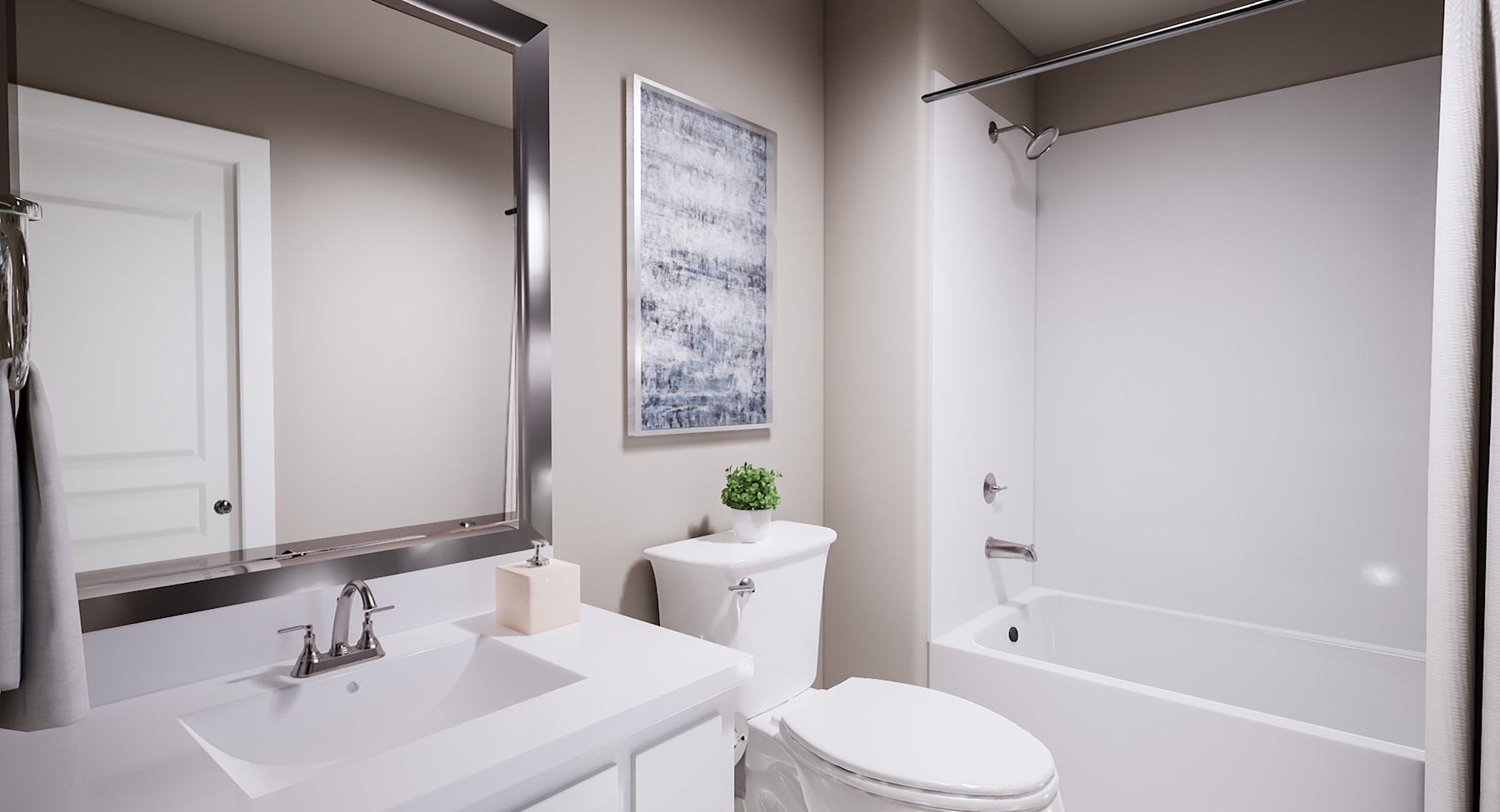A modern, minimalist bathroom with a white vanity, toilet, and framed artwork on the wall, creating a clean and serene atmosphere.