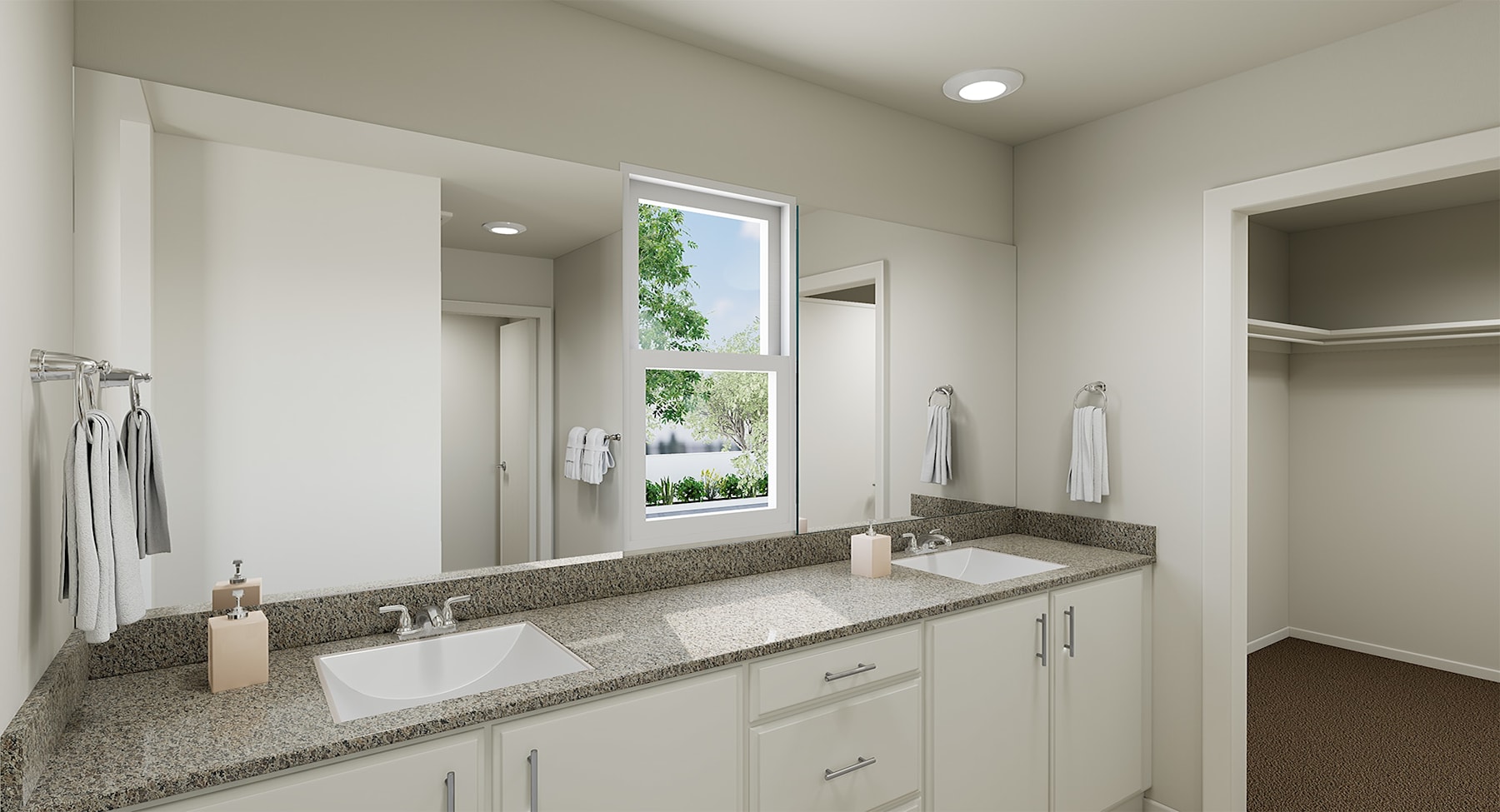 A modern, well-lit bathroom with a large window, a granite countertop, and a double vanity with white cabinets.