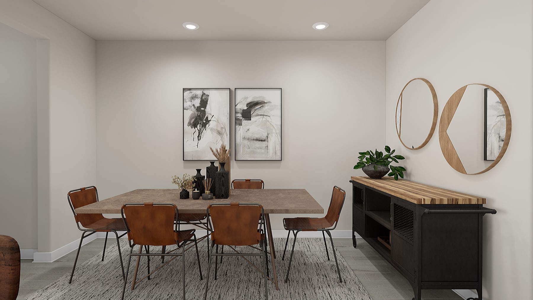A modern and minimalist dining room with a wooden table, leather chairs, and decorative wall art, complemented by round mirrors and a wooden sideboard.