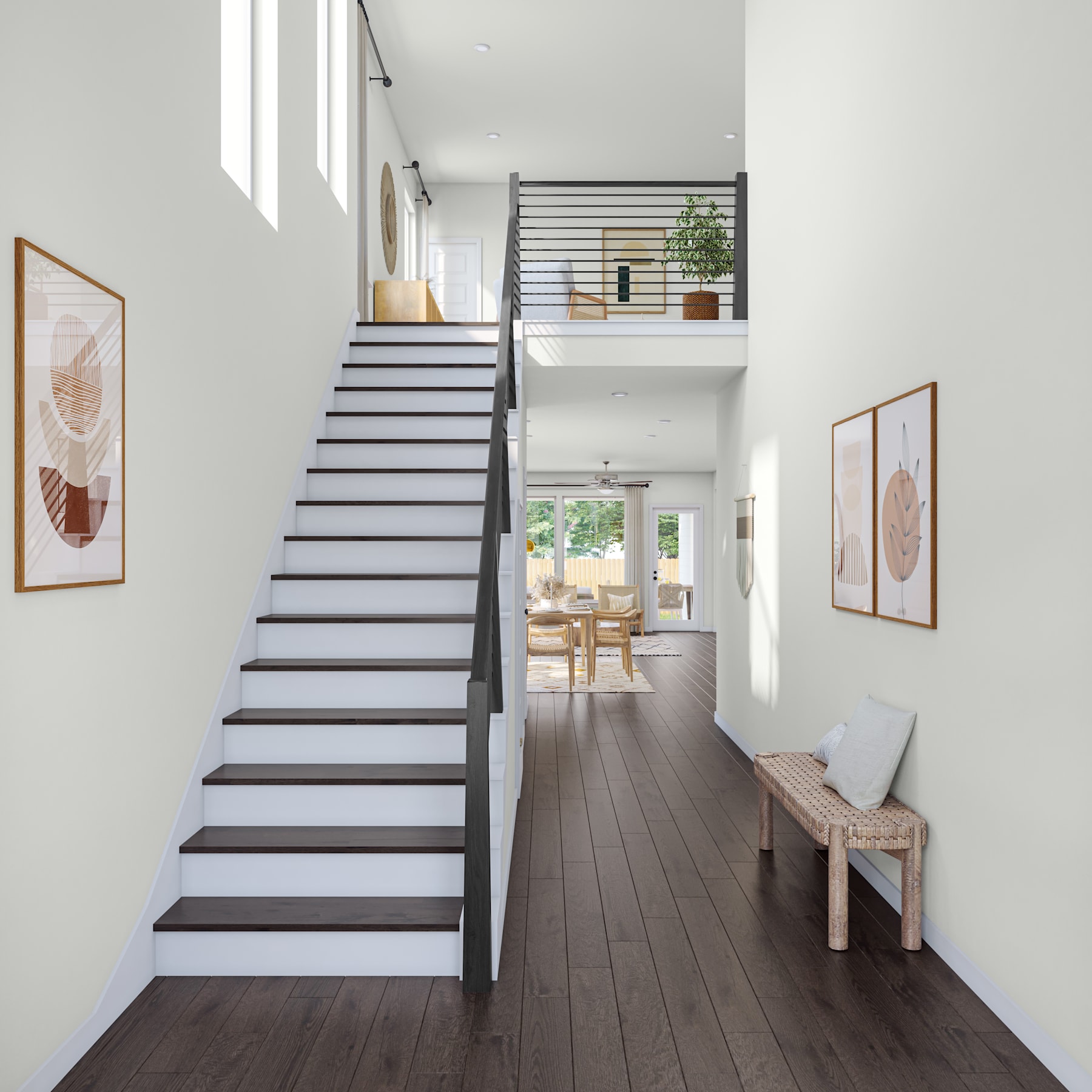 A modern, minimalist interior with a wooden staircase leading to an upper level, surrounded by white walls, framed artwork, and a wooden bench in the foreground.