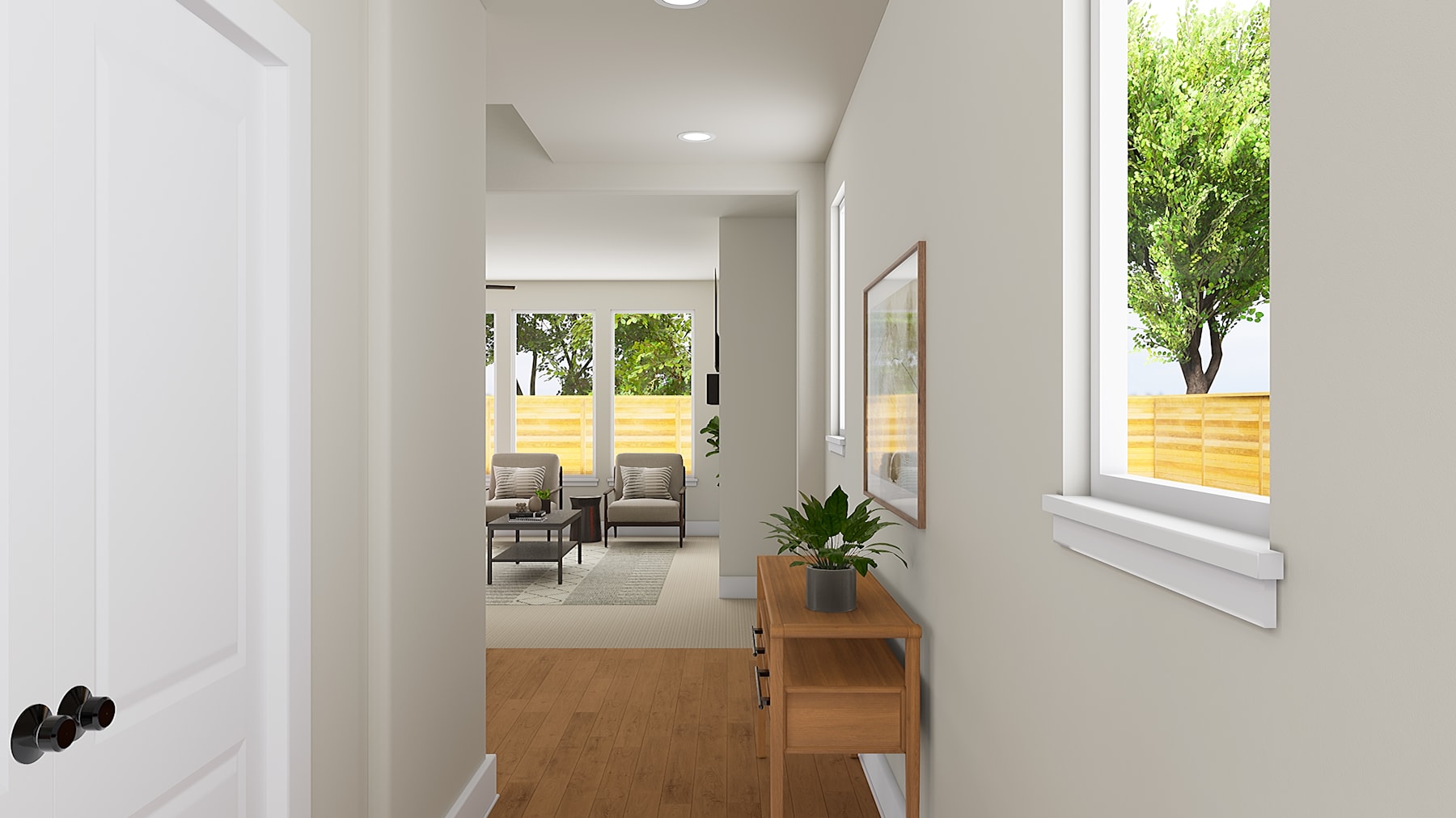 A bright and airy hallway with a wooden console table and a potted plant, leading to a room with chairs visible in the background and a view of the outdoors through the window.