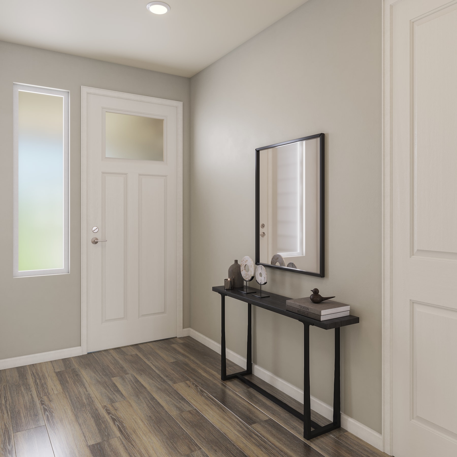 A modern and minimalist entryway with a wooden floor, a black console table, and a framed mirror on the wall.